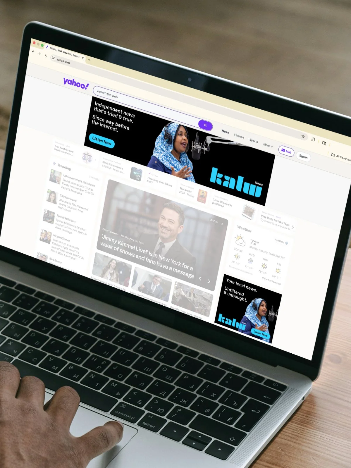 Laptop on Yahoo with KALW Public Media display ads in focus