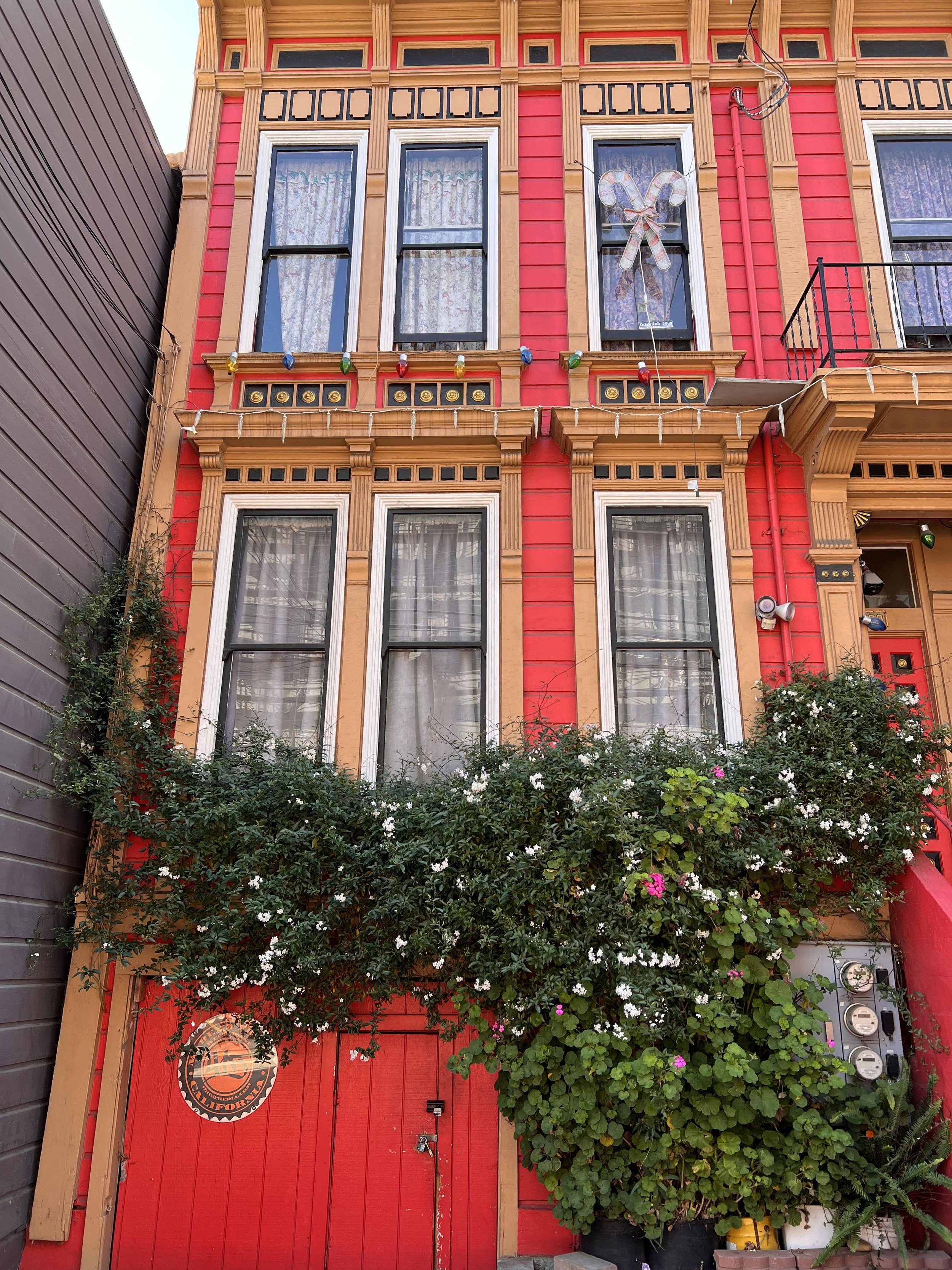 Mission Creek Neighborhood: red victorian home