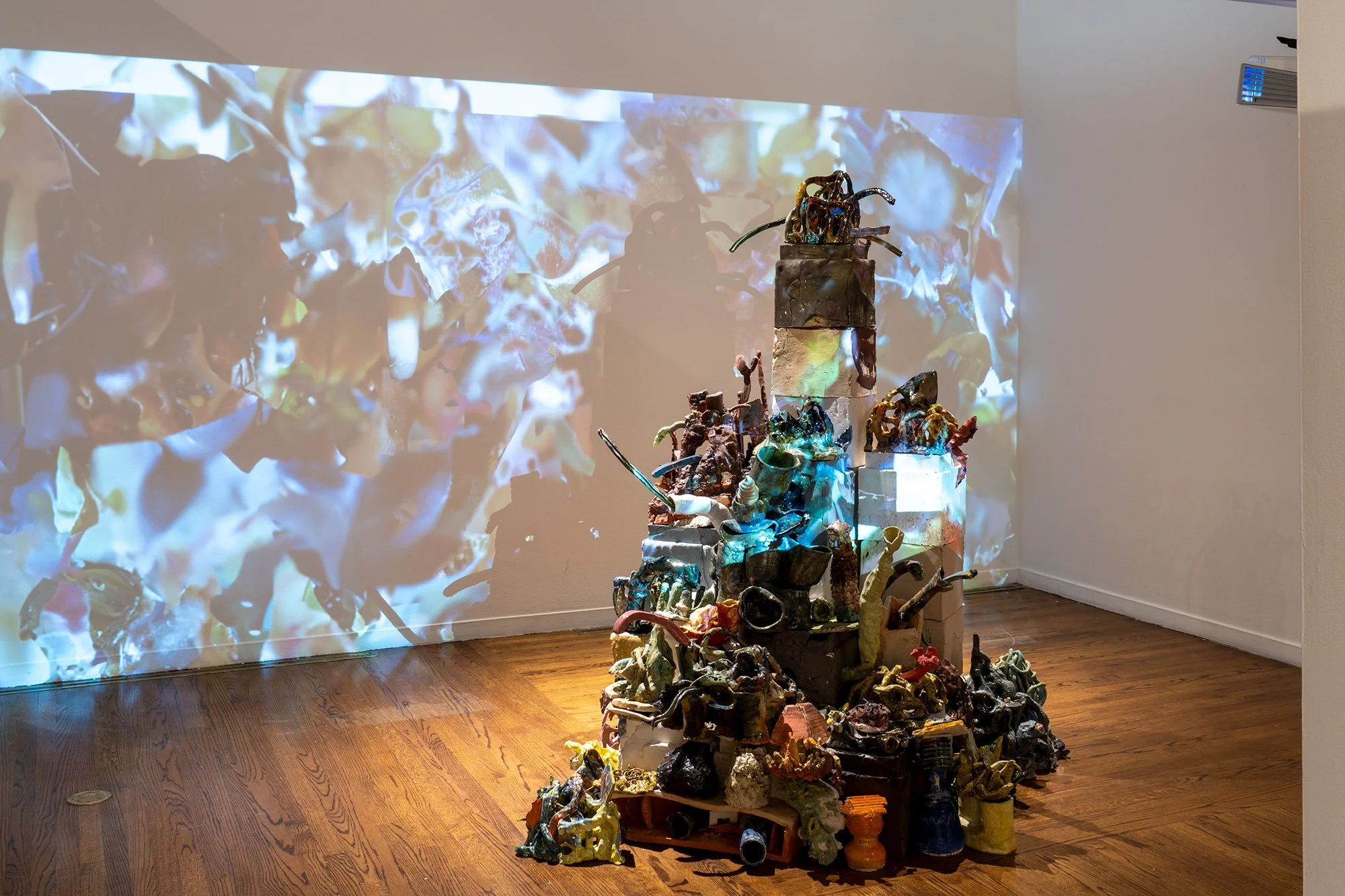 "Realities" 96 x 96 x 76" Ceramic and Projected installation 2025 Collaboration with Patrick Durka