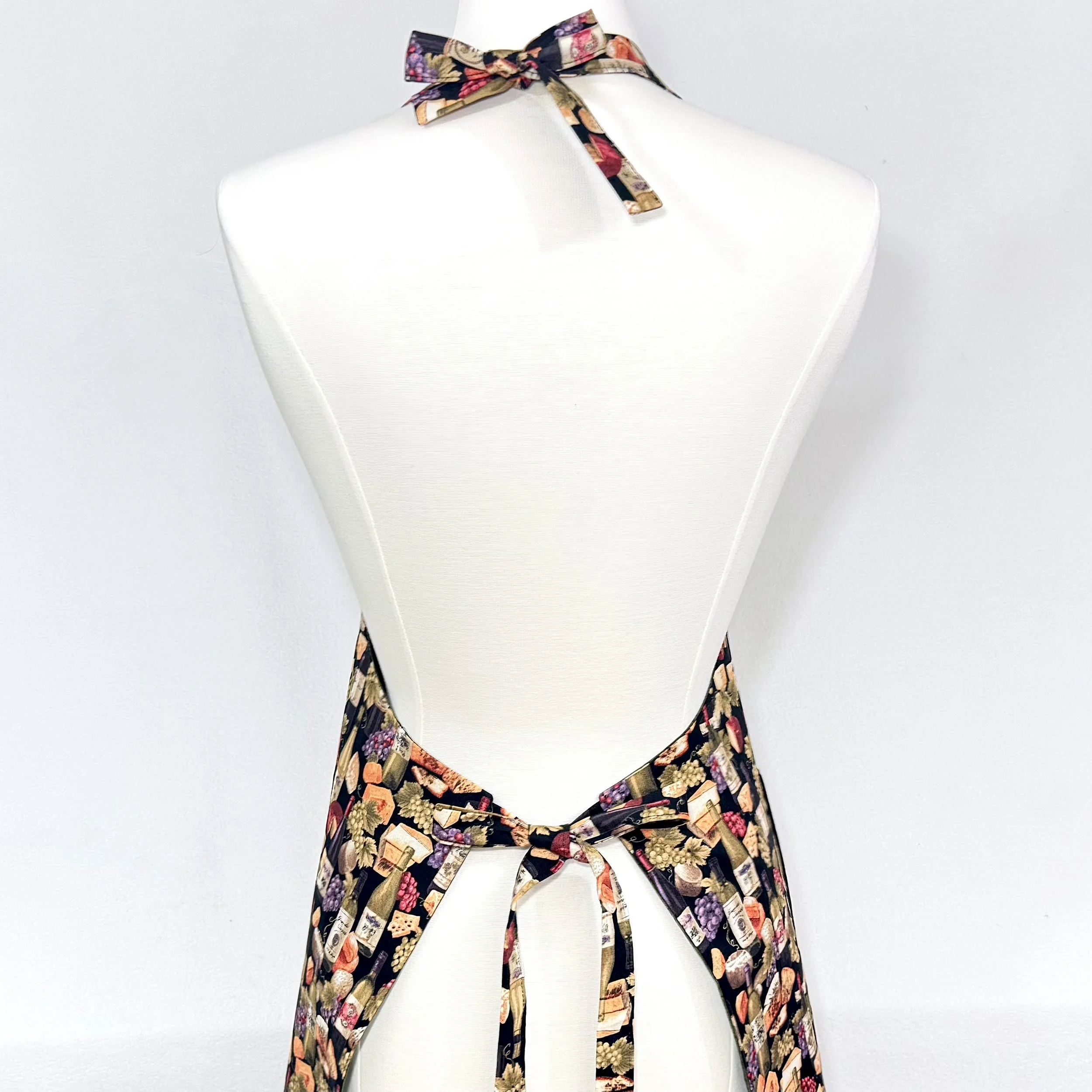 Apron shown from behind to display adjustable waist and neck ties