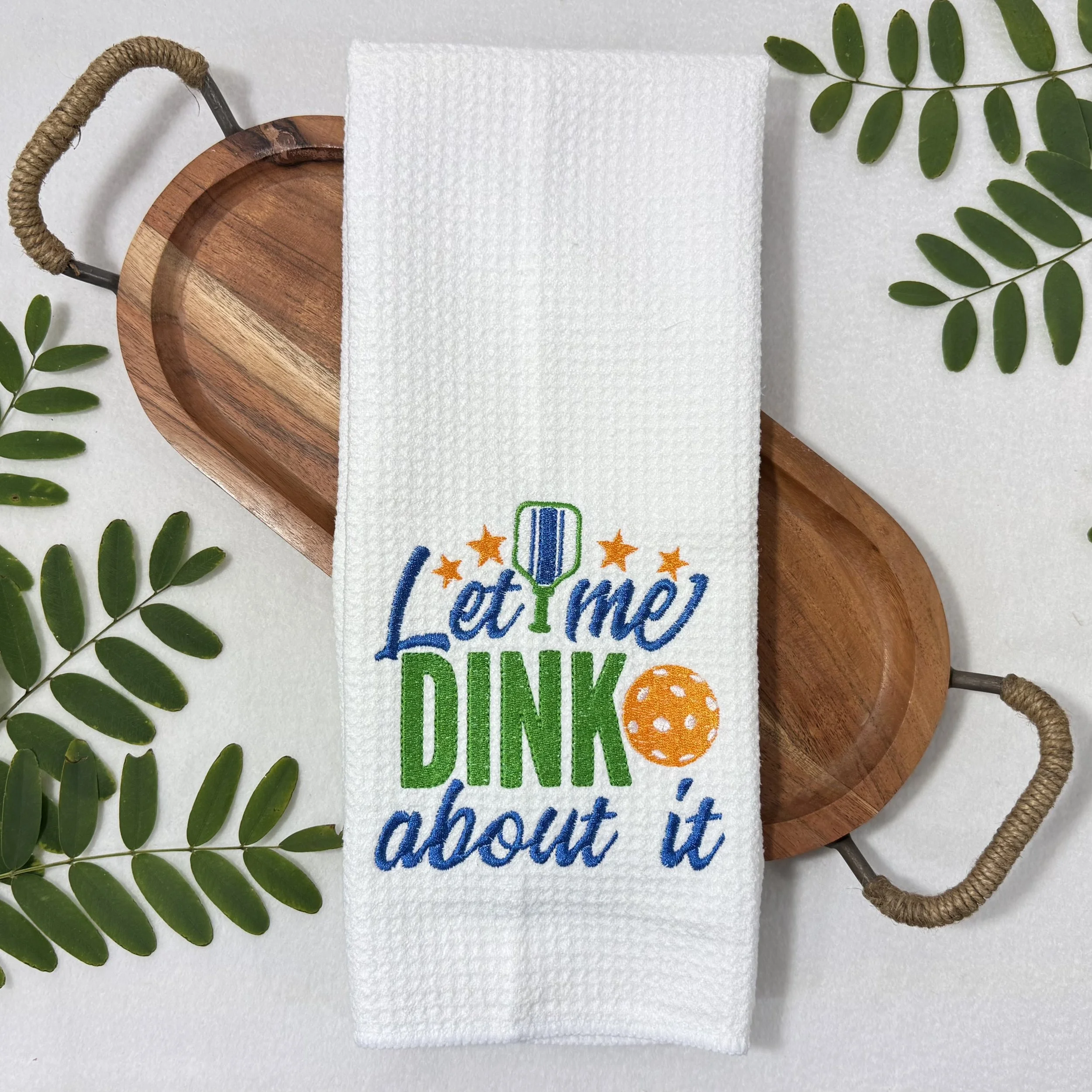 Let Me DINK About It embroidered microfiber kitchen and hand towel flat lay with greenery