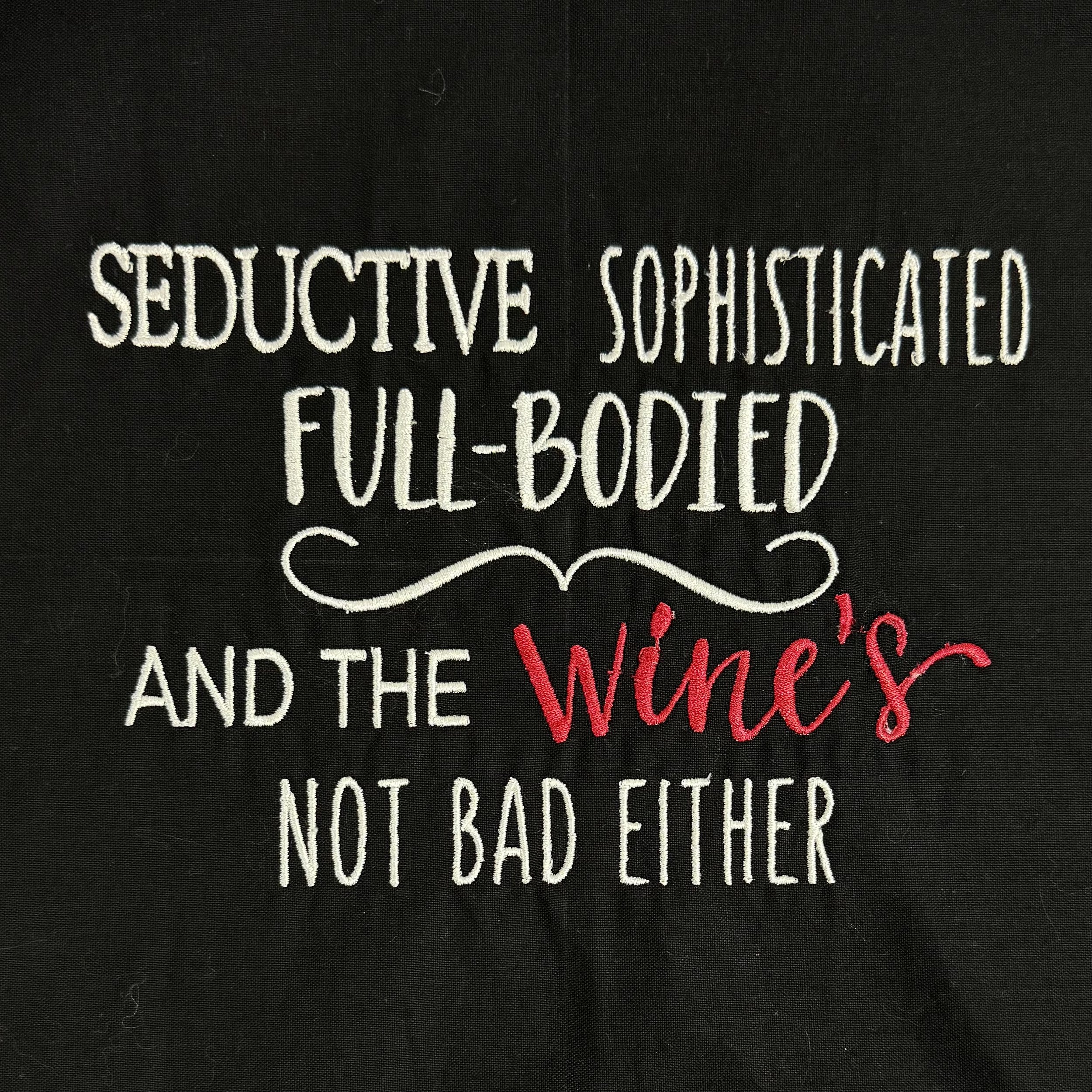 Seductive sophisticated full bodied and the wine's not bad either adult apron embroidery detail.jpeg