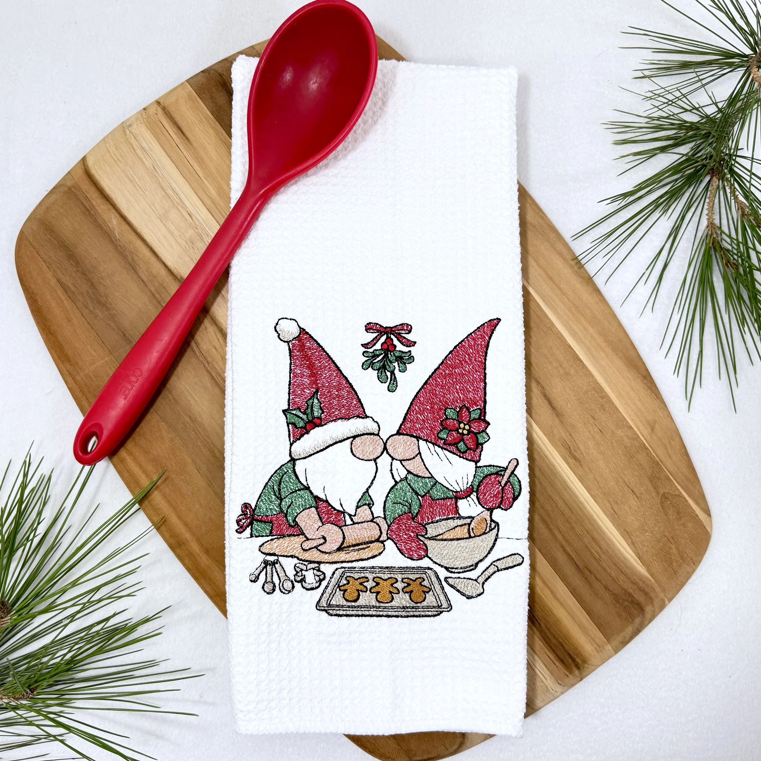 Christmas Gnomes Baking embroidered microfiber kitchen and hand Christmas towel flat lay with greenery and kitchen tools
