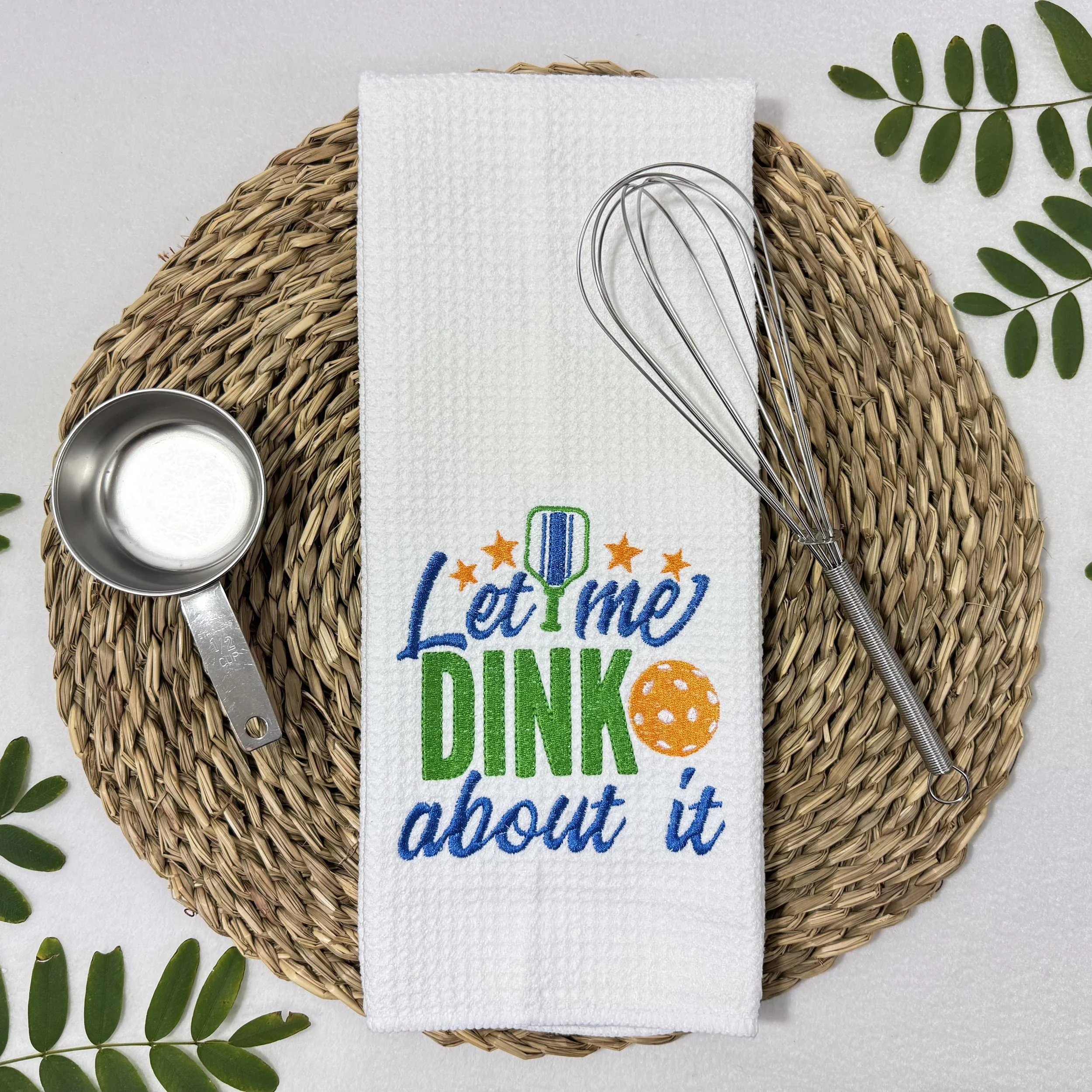 Let Me DINK About It embroidered microfiber kitchen and hand towel flat lay with greenery and kitchen tools