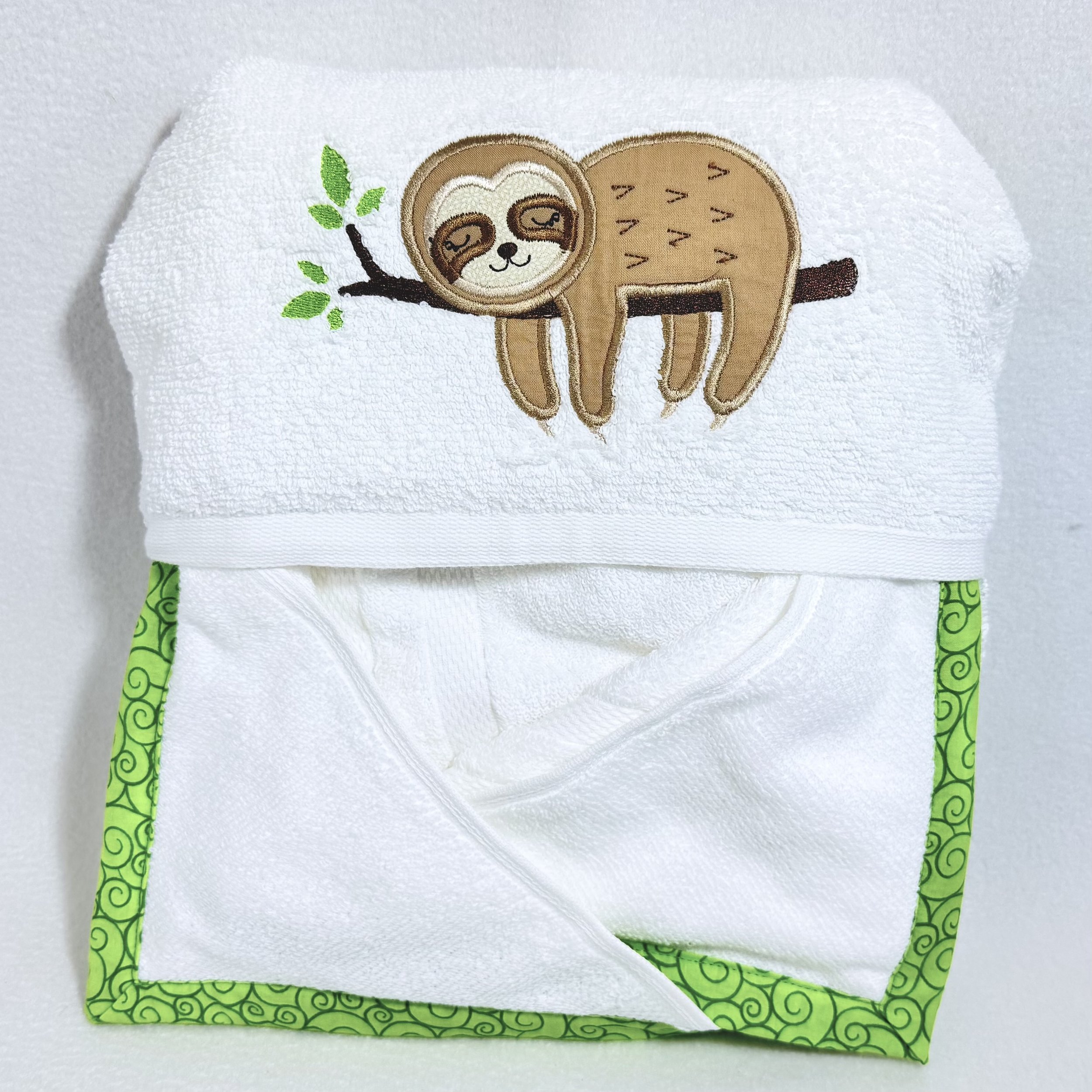 sloth on hooded towel.jpeg