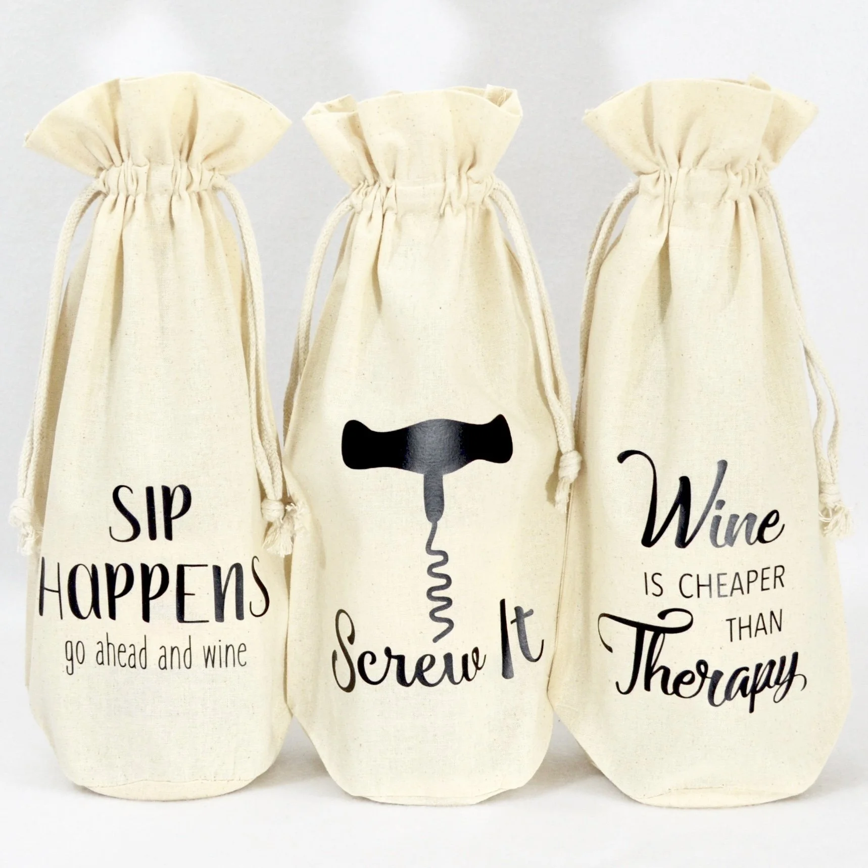 Muslin wine bag trio: Sip Happens goa ahead and wine, Screw It, Wine is cheaper that therapy.  Displayed on bottles