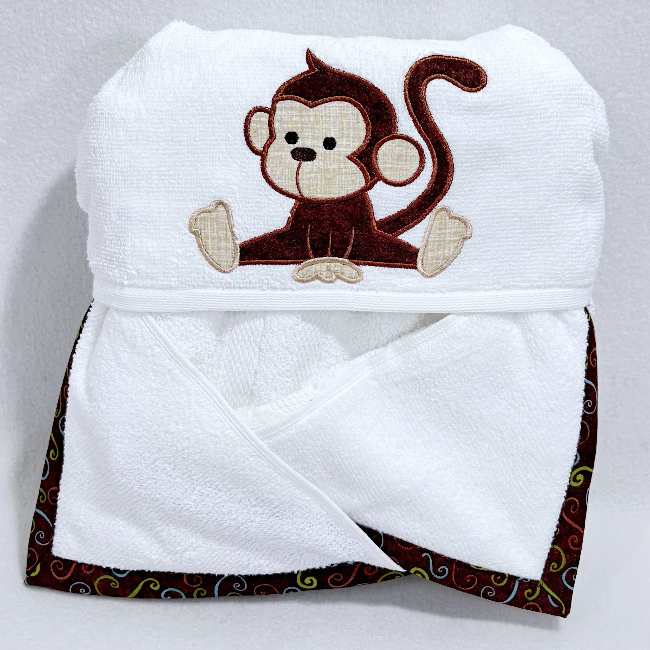 Monkey hooded towel folded.jpeg