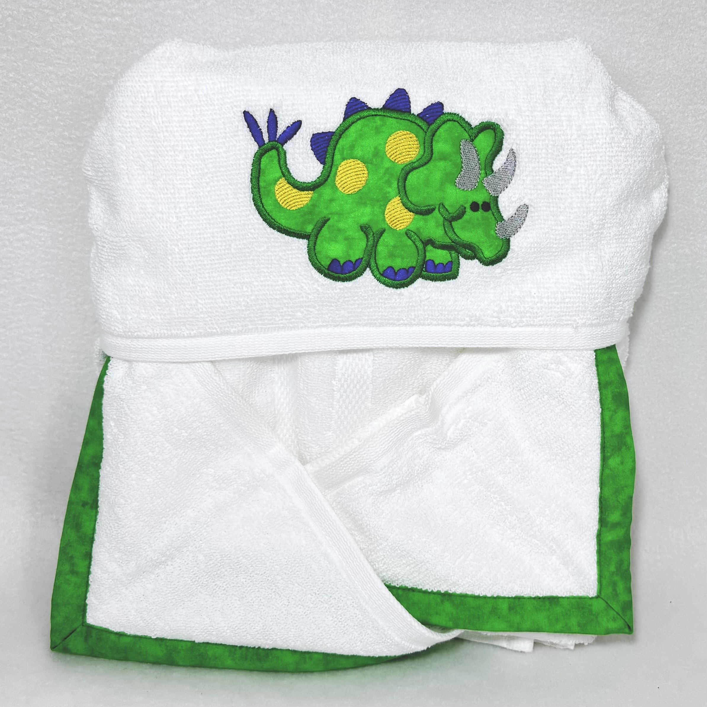 stegasurus hooded towel folded.jpeg