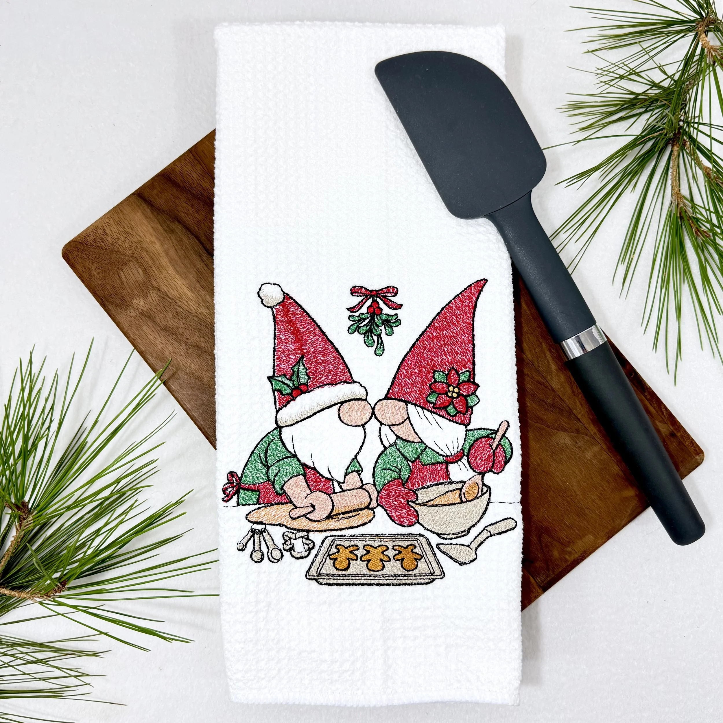 Christmas Gnomes Baking embroidered microfiber kitchen and hand Christmas towel flat lay with greenery and kitchen tools