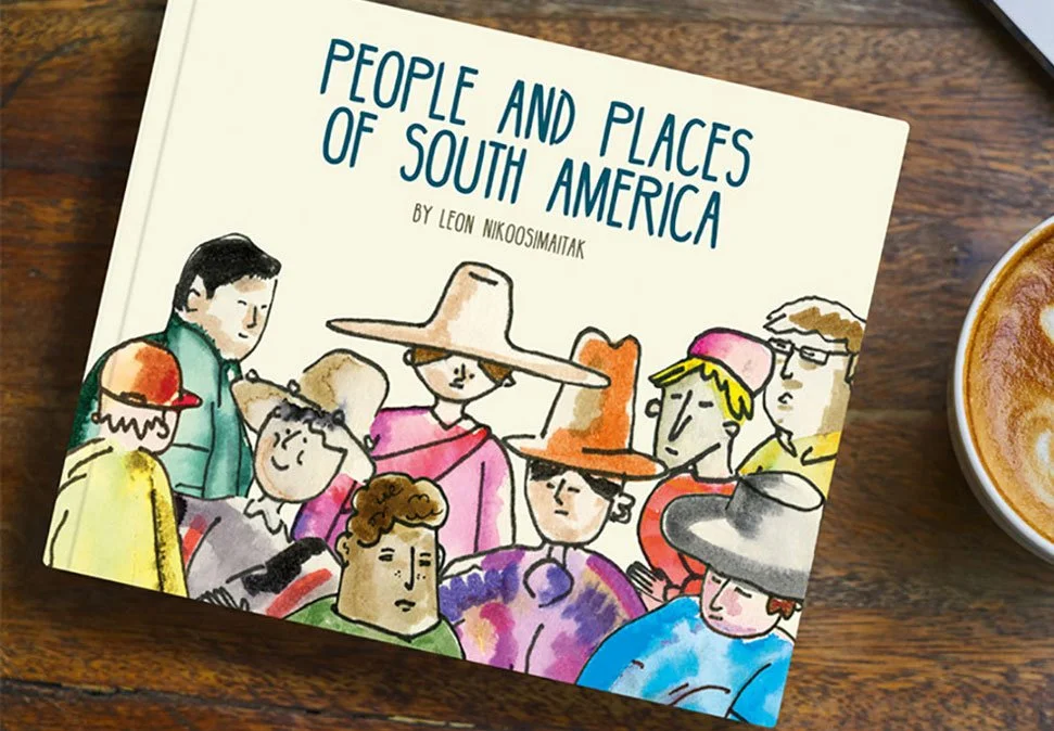 Cover of a book titled 'People and Places of South America' by Leon Nikoosimatak, featuring an illustration of diverse people wearing colorful clothing and hats, on a wooden surface with a coffee cup.
