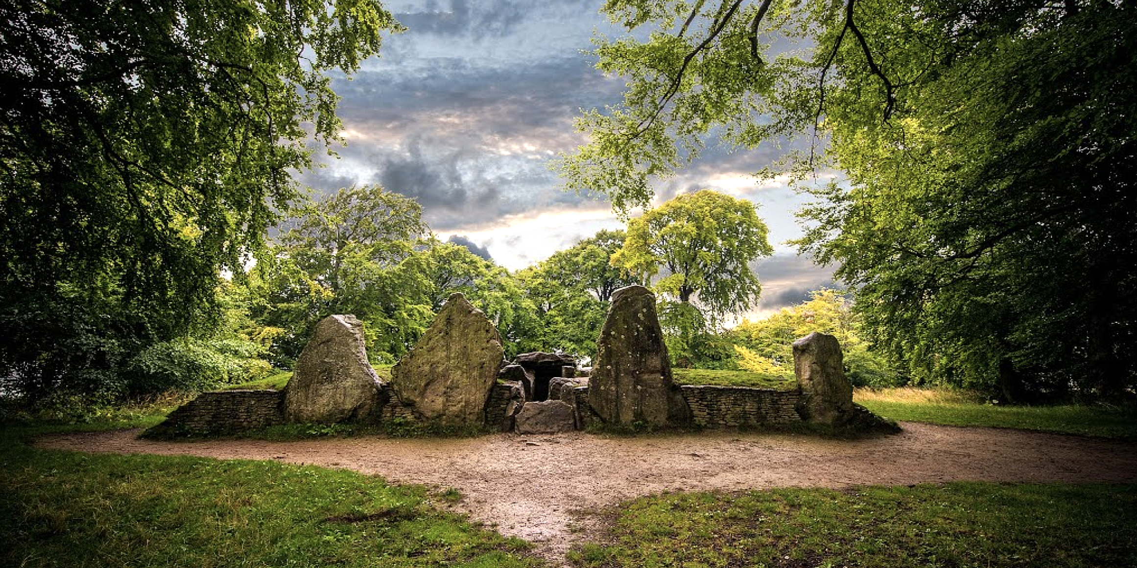  WAYLAN'S SMITHY  is a Neolithic burial and initiation site in Wiltshire, England. It includes a passage grave surrounded by a sacred grove of trees.