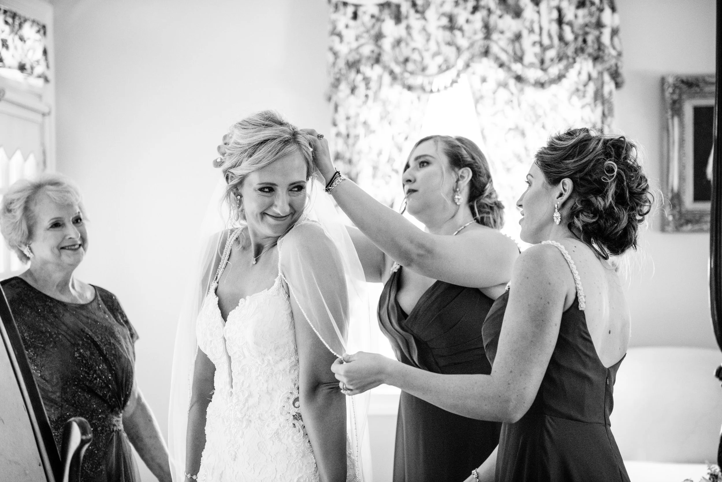 The getting ready photos might be some of the most underrated photos from a wedding day. 

And this wedding at Kent Island Resort is a perfect example of why.

Because before the ceremony, before the first dance, before everyone is watching you get t