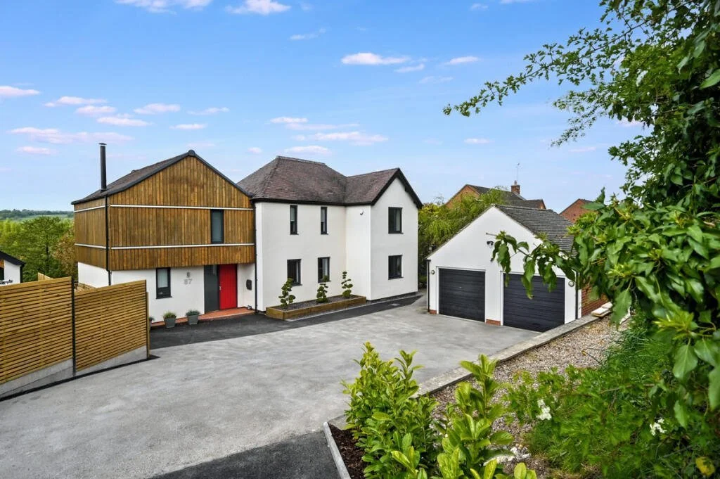 Full retrofit and timber wrap around addition