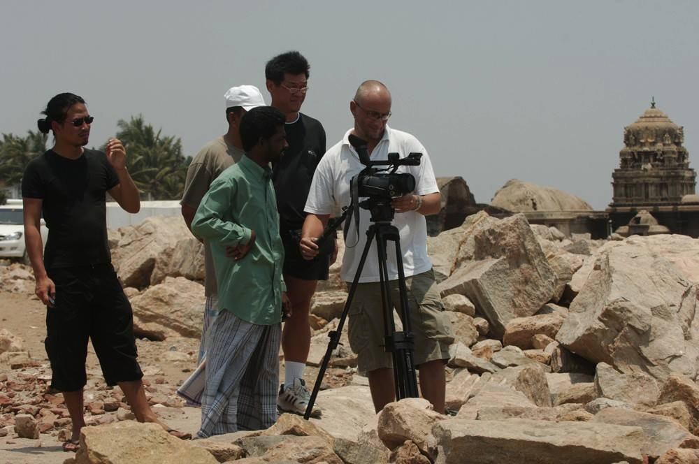 Director Harold Monfils with DoP Cheong Yuk Hoy and producer Ernest Hariyanto setting up a shot in Tranquelabar, South India.