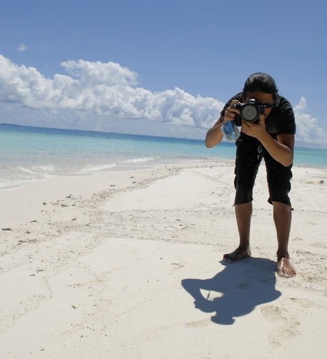 Capturing still at a remote sand island in the Maldives.