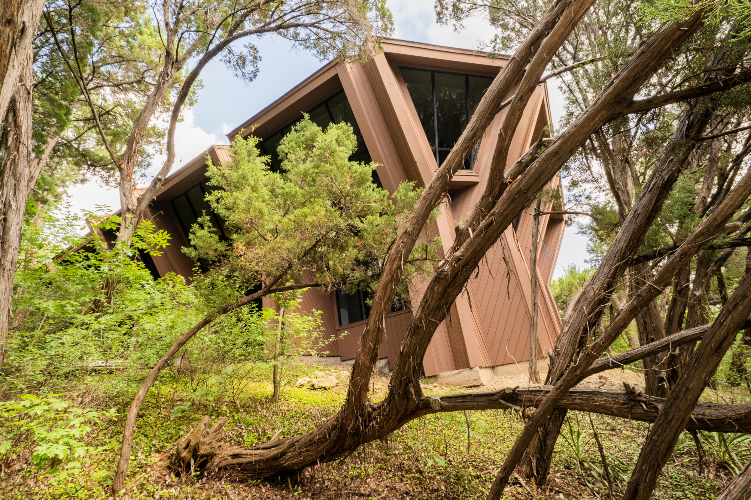 1201 Spyglass Dr. Austin, TX. Modern office space surrounded by nature in a building with award winning architecture near downtown and the greenbelt.