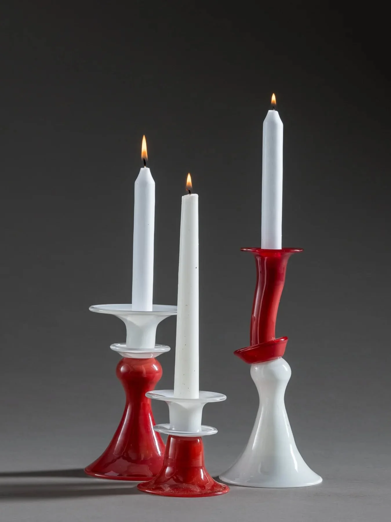 Candle holders.

On a them got glued wonky ways but it still exists.

-
-
-
-
-

#Candle #holders #glass #handmade #craft #colours  #glassblowing