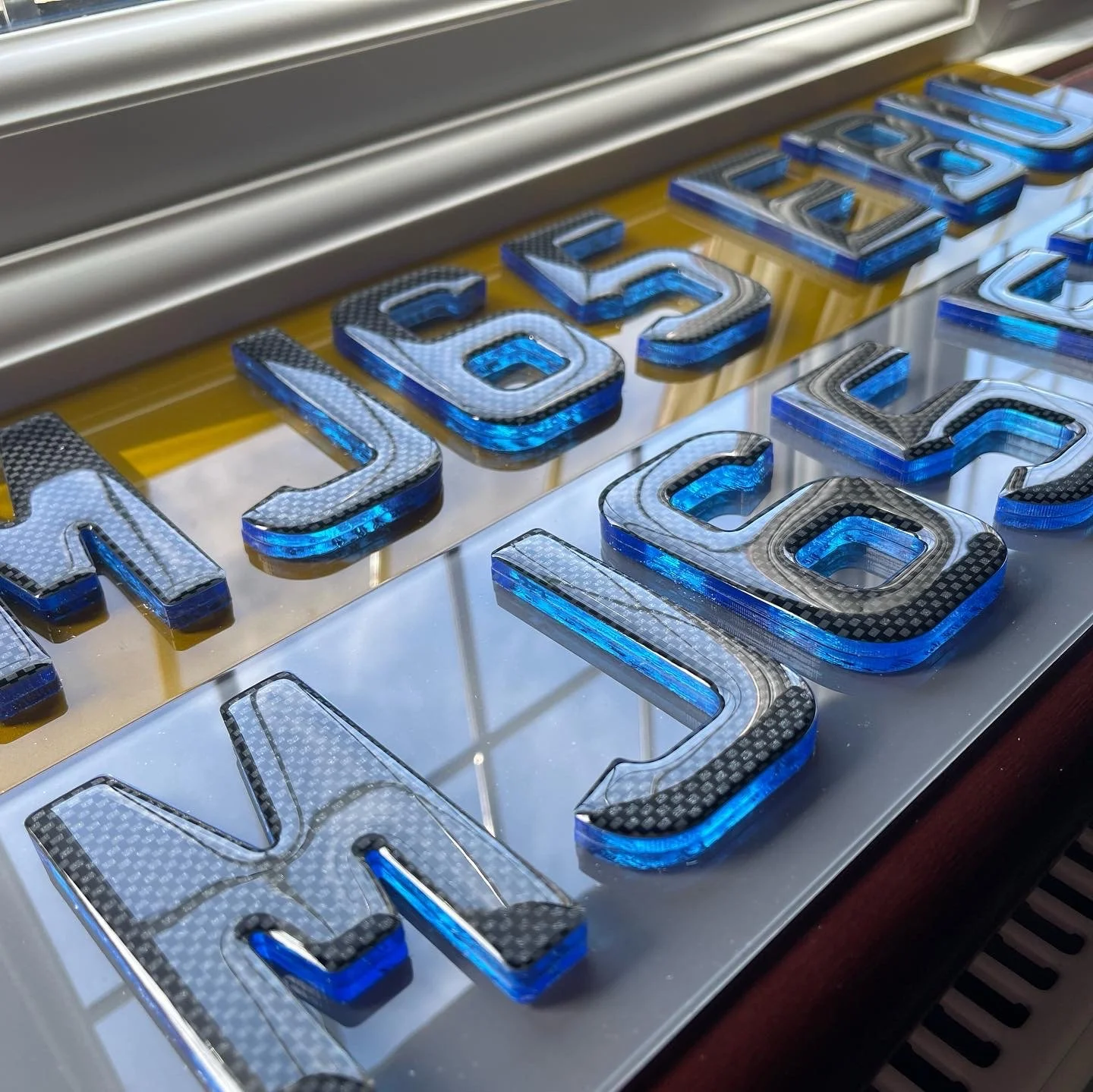 Double Topaz Blue & Carbon