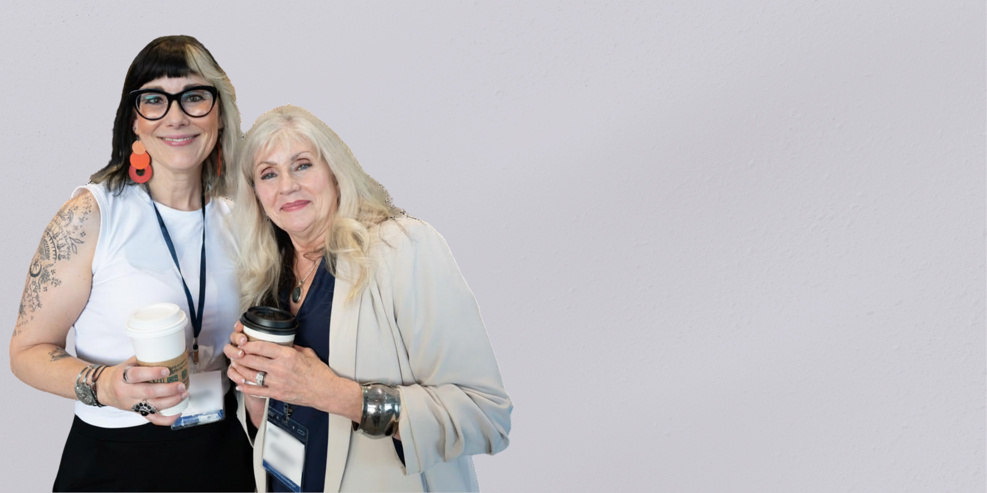 Image of two happy women supporting How Good Humans Sell principles