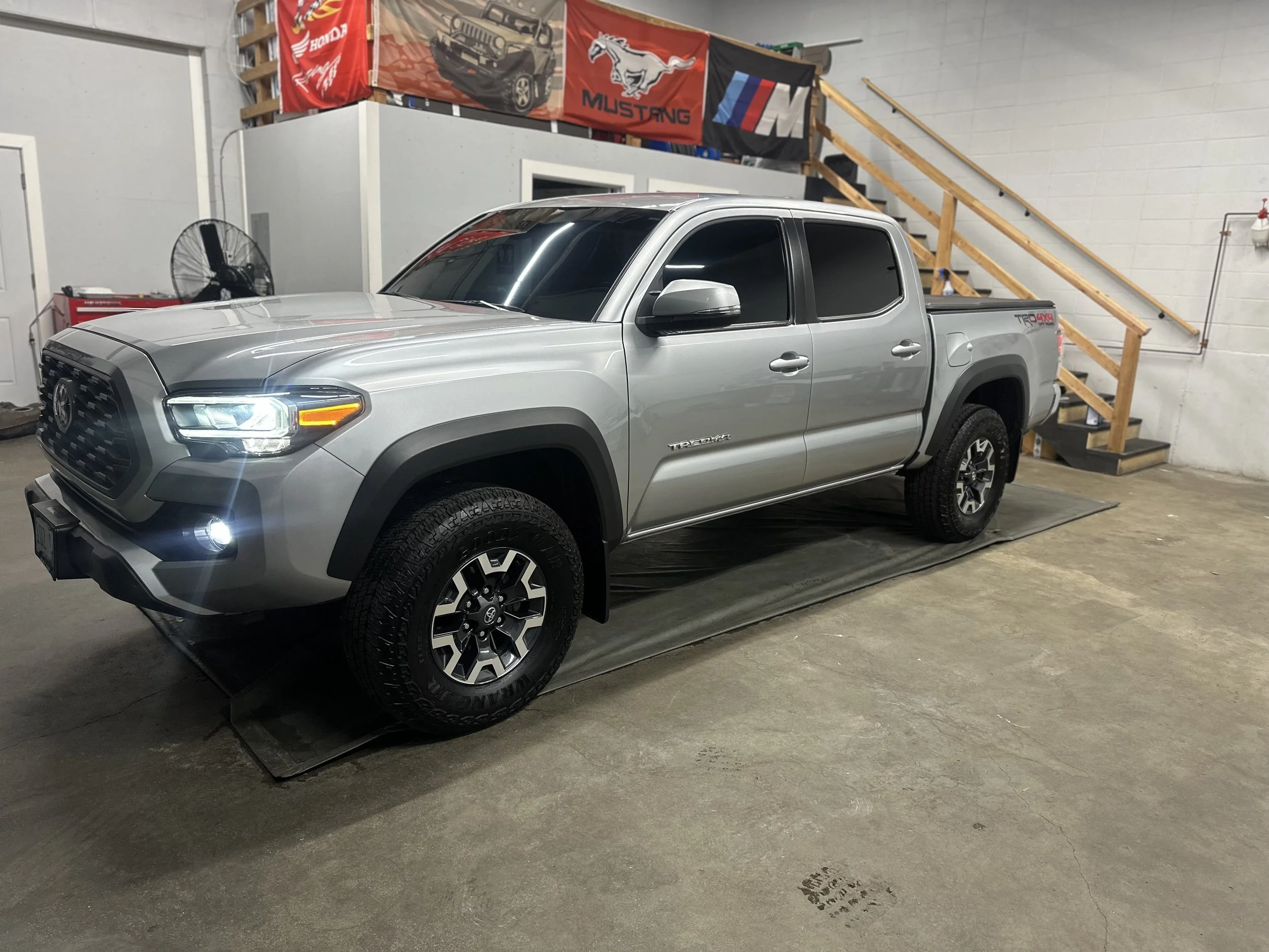 Tacoma tinted all around including windshield tint.