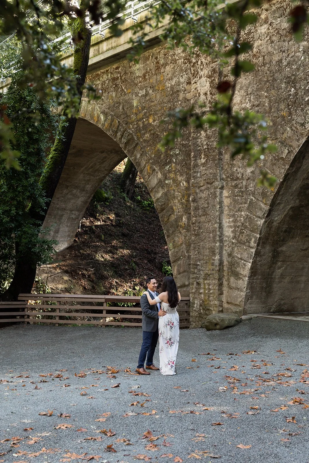 Engaged couple poses for engagement photography session at Saratoga Springs Wedding Venue