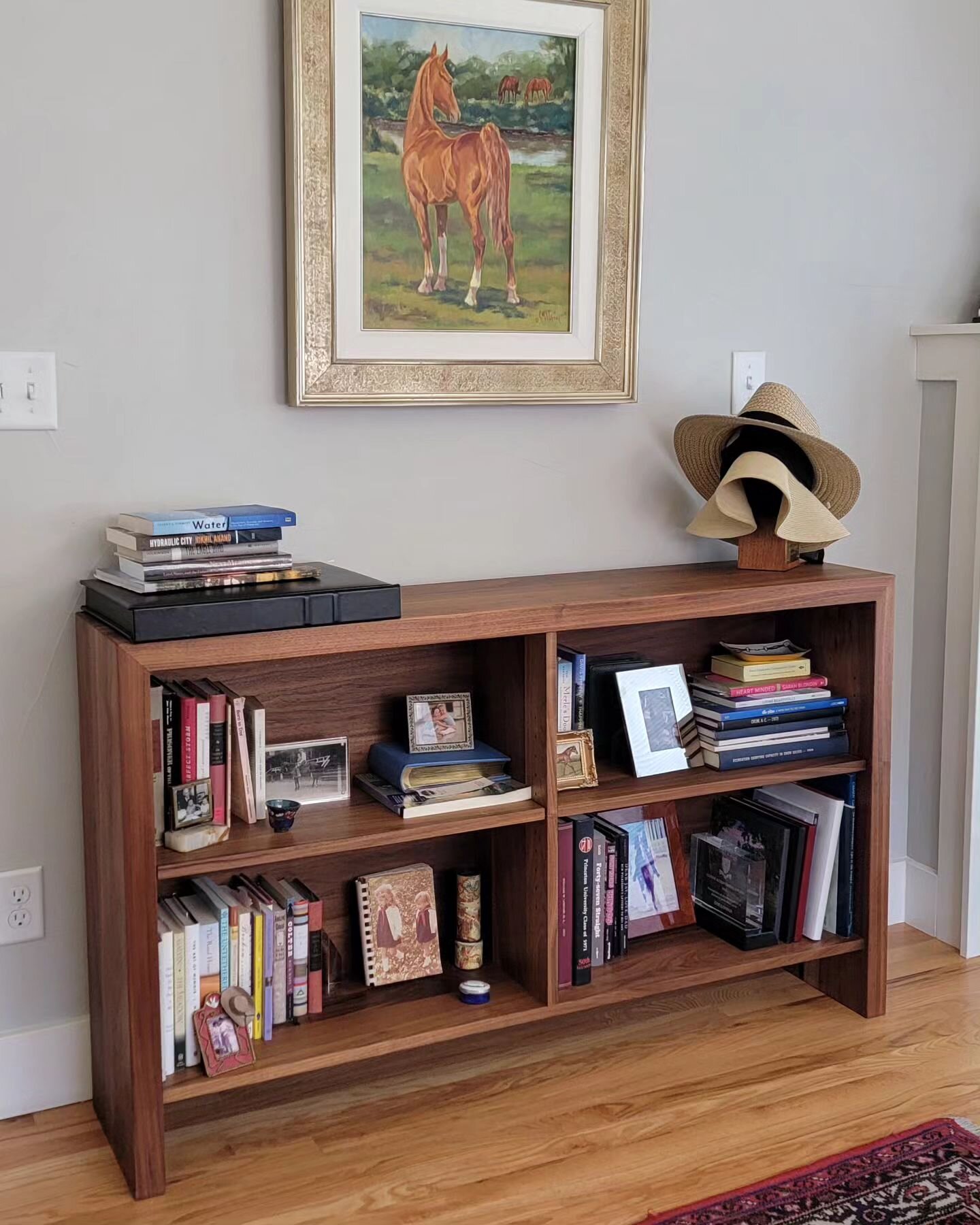 In a recent visit with a client, we got a peek back at some of our furniture in the wild. Thanks to Mrs. London for her continued patronage. There isn't much furniture in her house that we didn't build at this point!

Shown here is a custom bookshelf