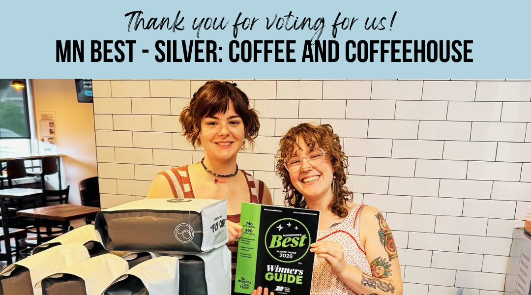 Two woman proudly holds the 2026 Star Tribune Minnesota Best magazine featuring Compassion Coffee, recognized as Second Place for Best Coffee and Best Coffeehouse in Anoka, Minnesota. This award highlights Compassion Coffee's handcrafted coffee, welc
