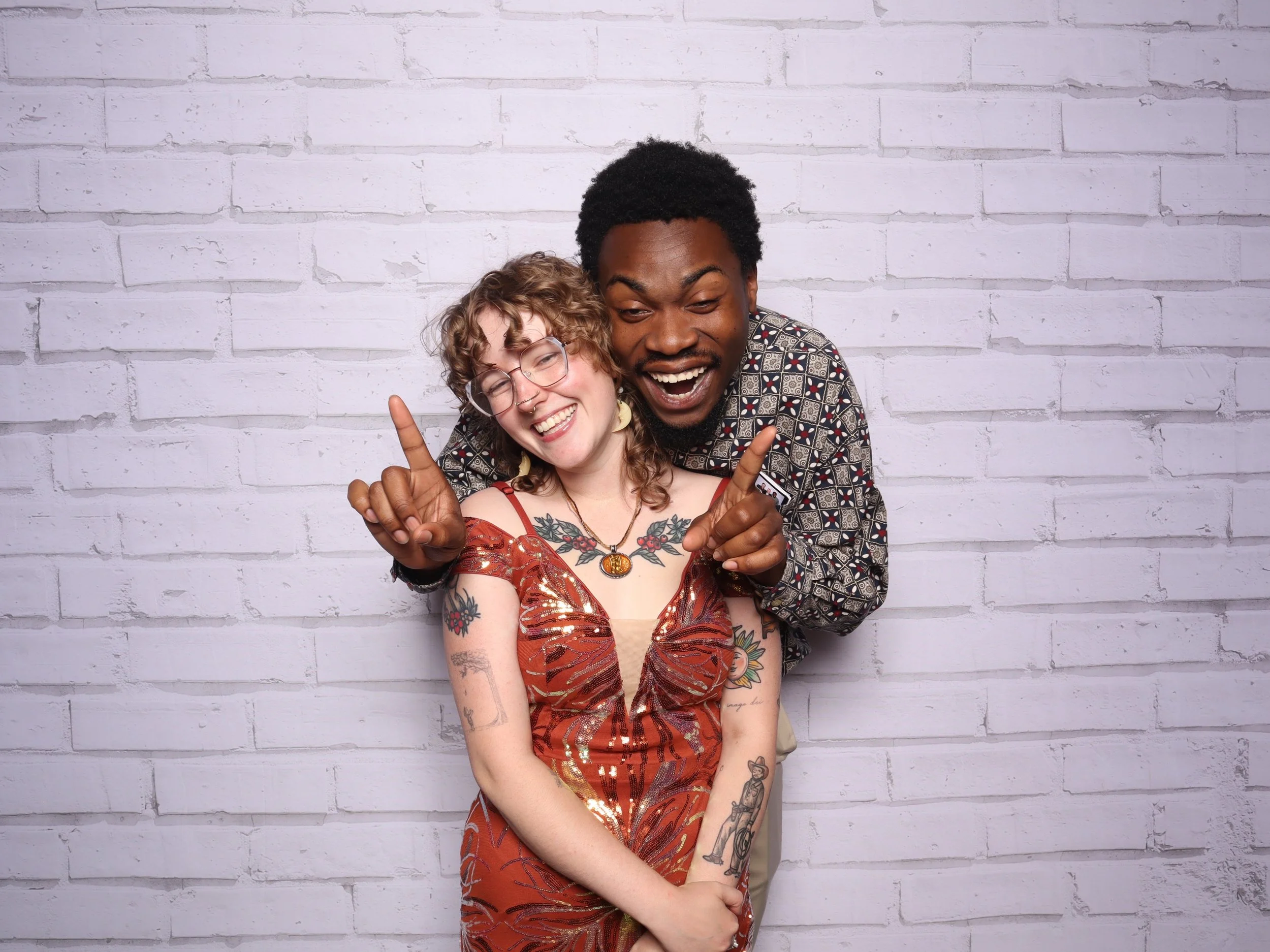 A couple smiling a Compassion Gala