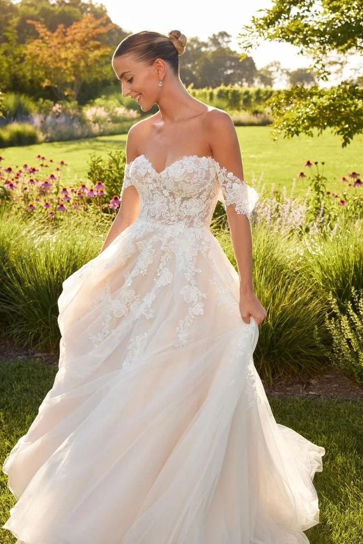 Twirl in this beautiful A-line tulle wedding gown….jpeg