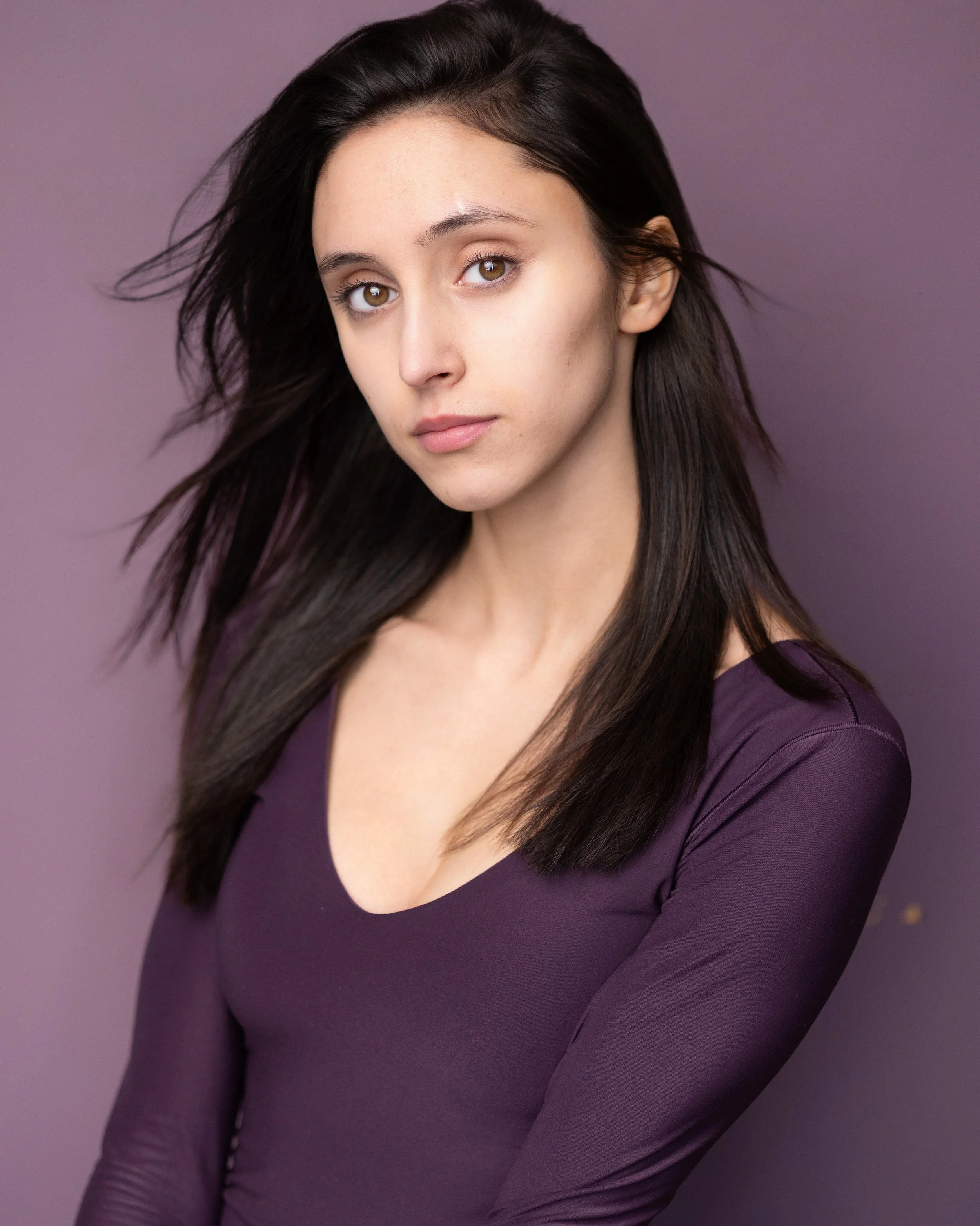 smiling women with long dark hair actor headshot by tammy brice in minneapolis 
