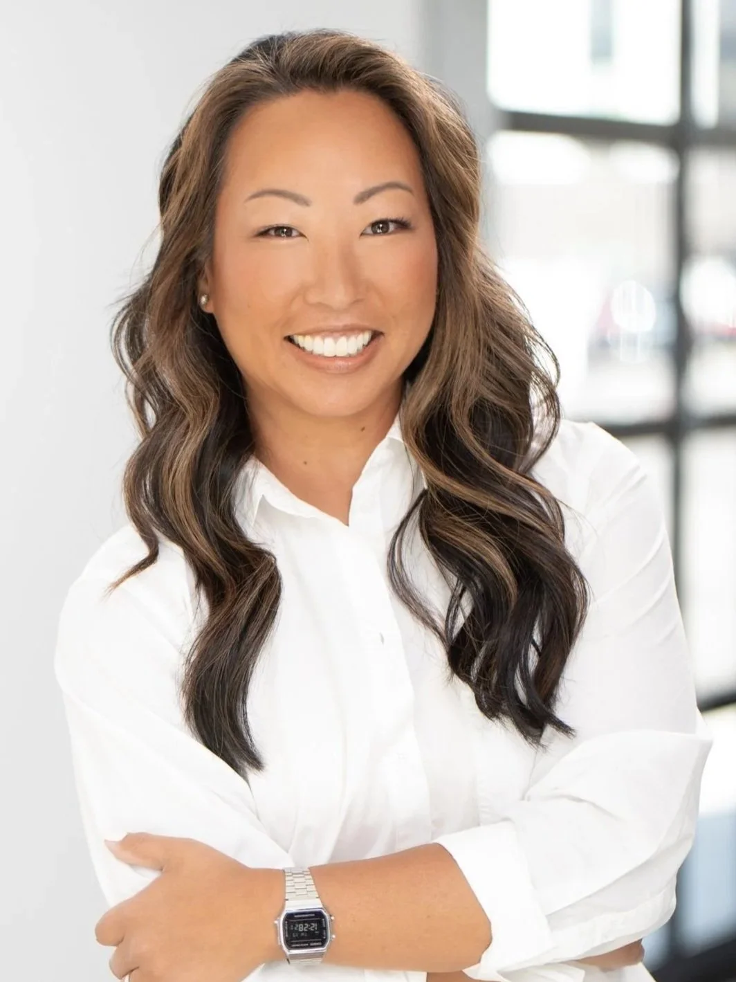 woman in white shirt smiling headshot by tammy brice in minneapolis