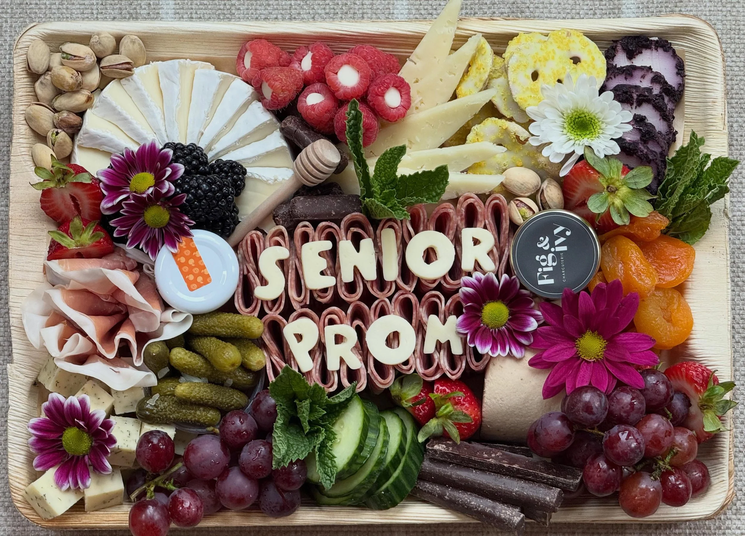 Serving glam, grapes, and prom night snacks ✨🍓🎀💃

#cheeseletters #mncharcuterie #promcharcuterie #cheeseboard #mncatering
