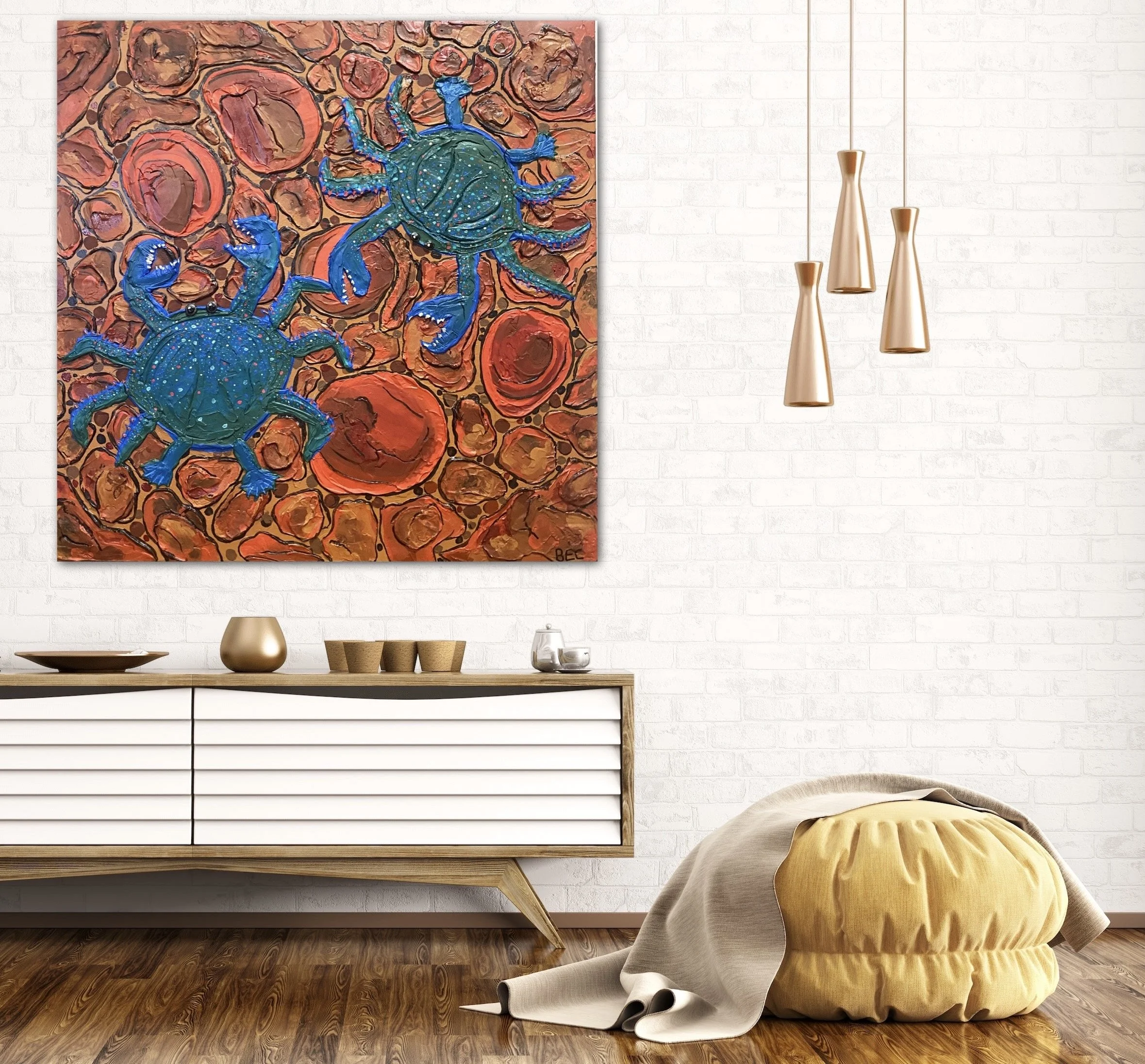 Painting of two large blue crabs with detailed textures, set against an abstract background of red and orange circular shapes, displayed in a modern living room.