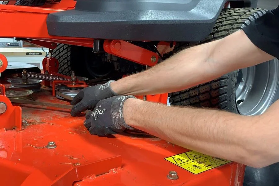 Precision mechanical servicing of commercial mower deck components