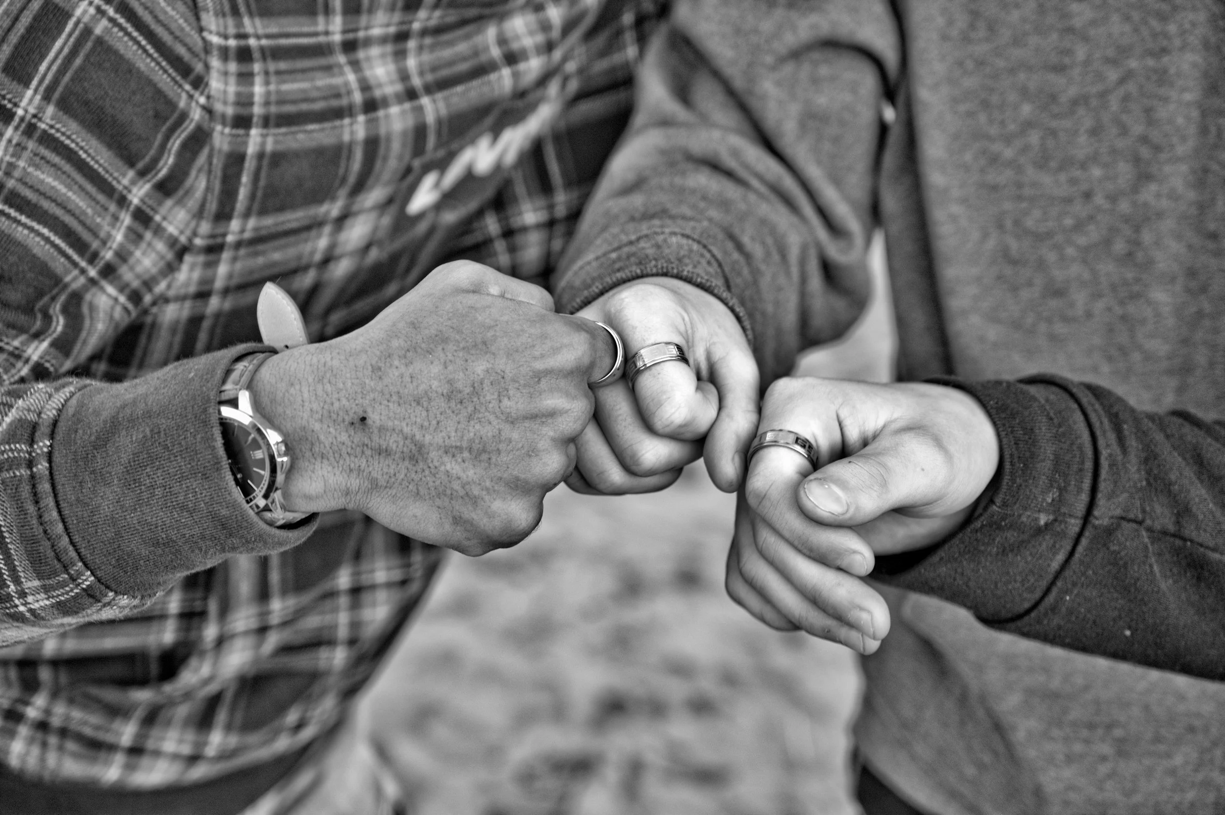 hands fist bumping