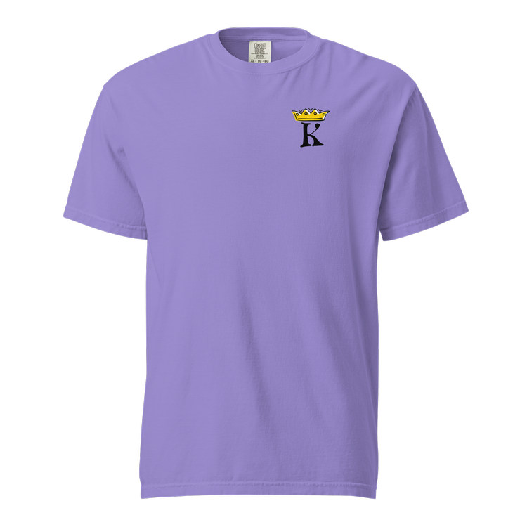 A lavender Kaeleeetv T-shirt with a small graphic of a yellow crown above a black letter "K" on the left chest area.