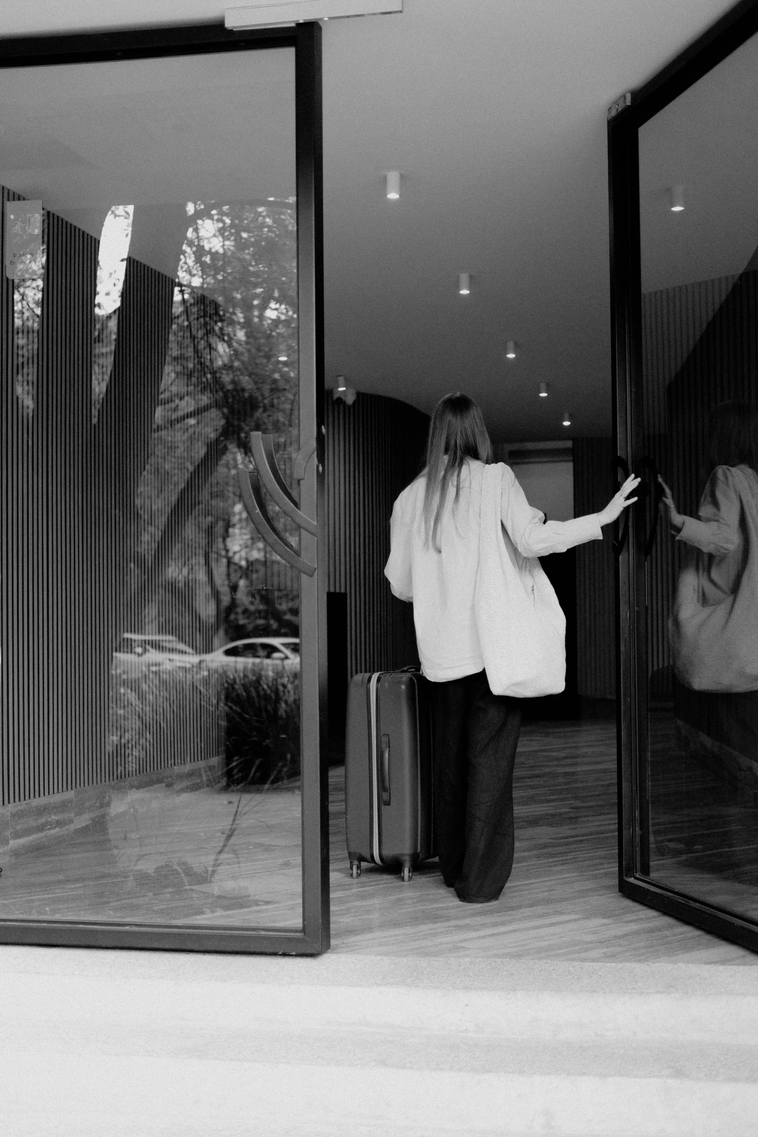 opening a hotel door person walking in
