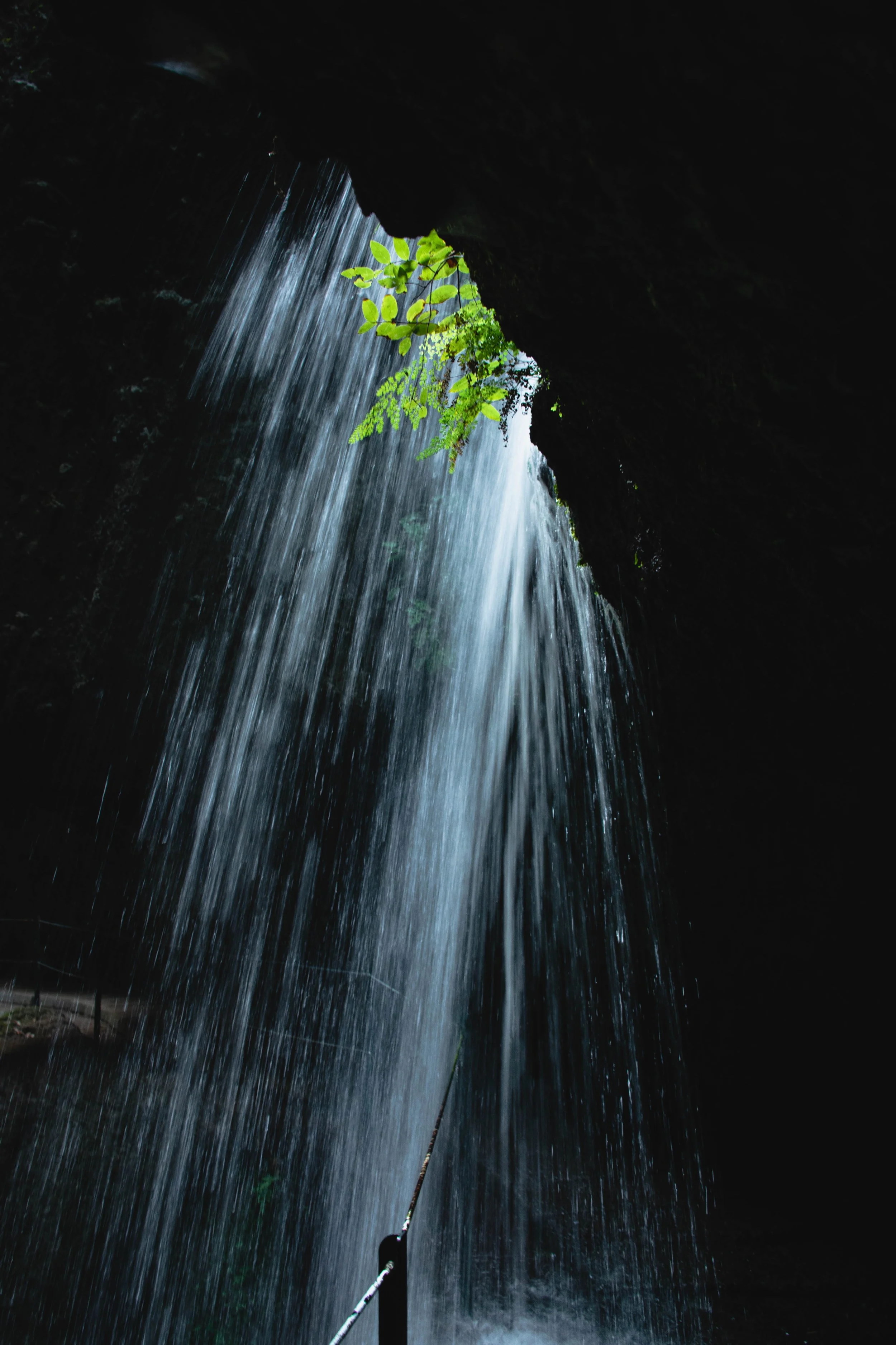 water of the levada nova waterfall from behind
