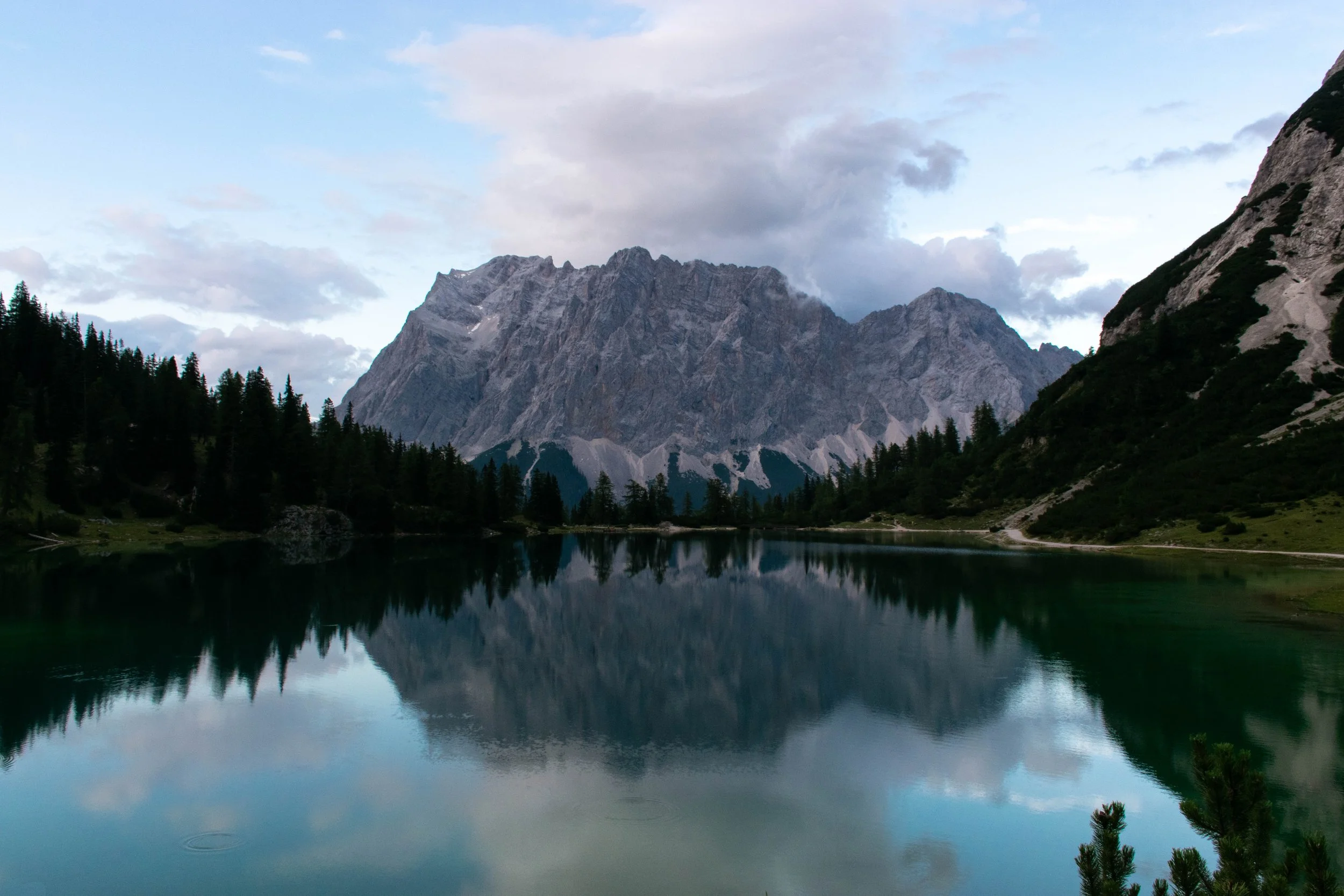 landscape shot of a mountain reflecting in a lake below
