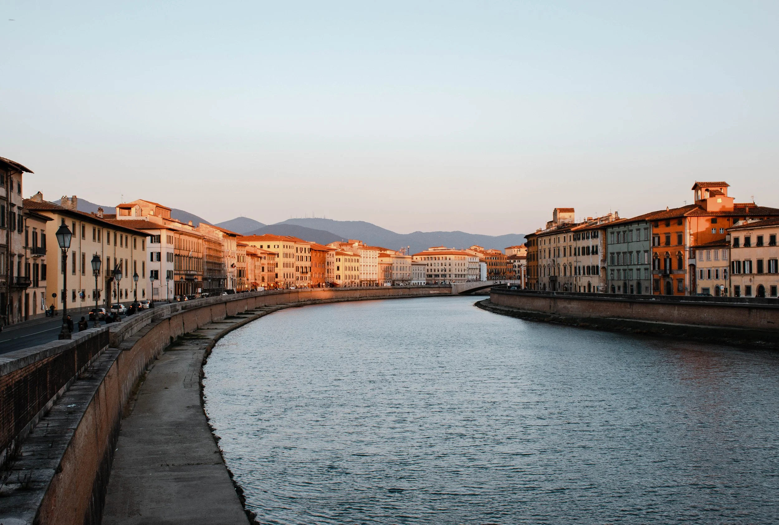 arno river pisa at sunset