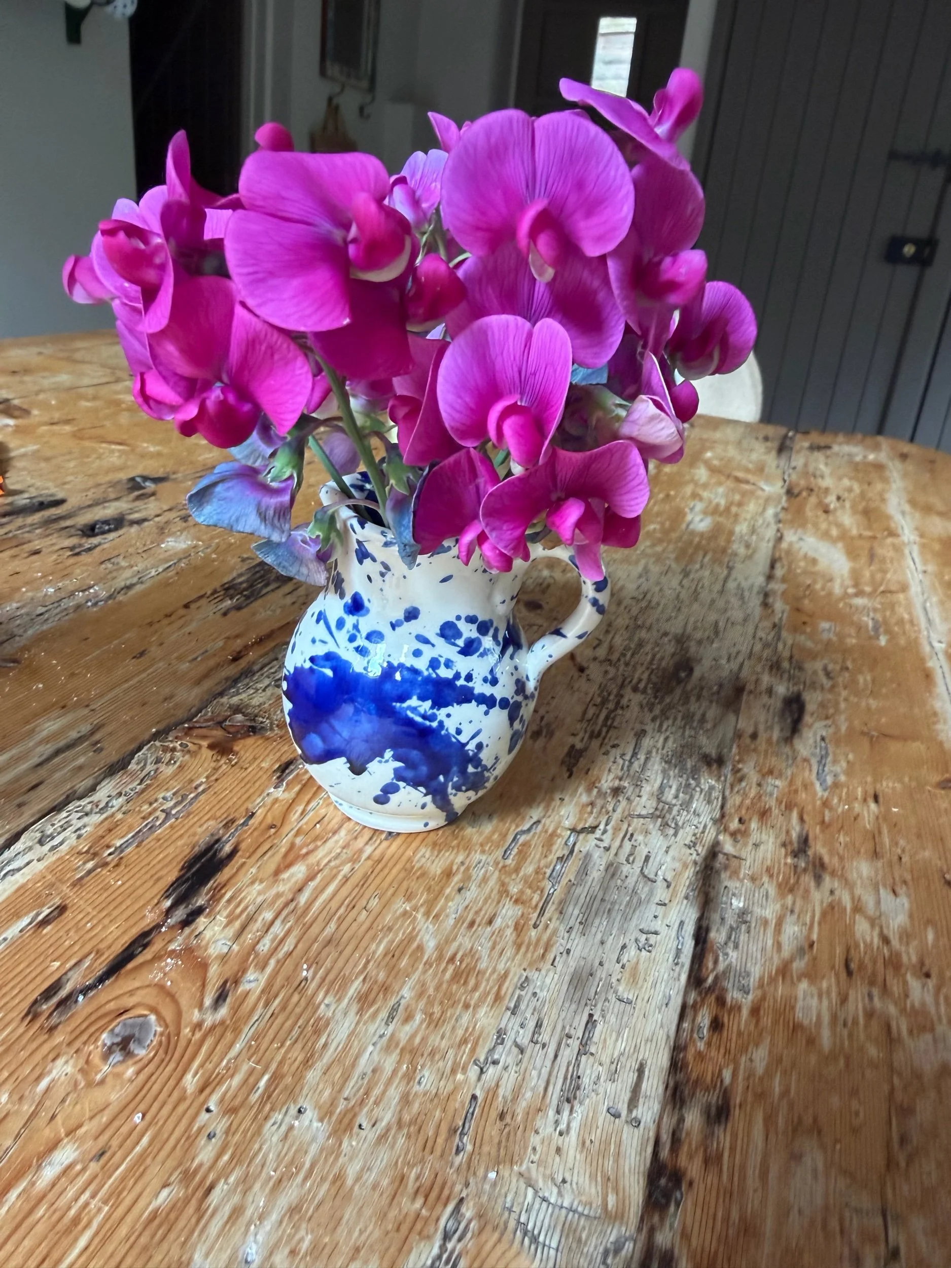 Handpainted blue and white mini jug with floral pattern