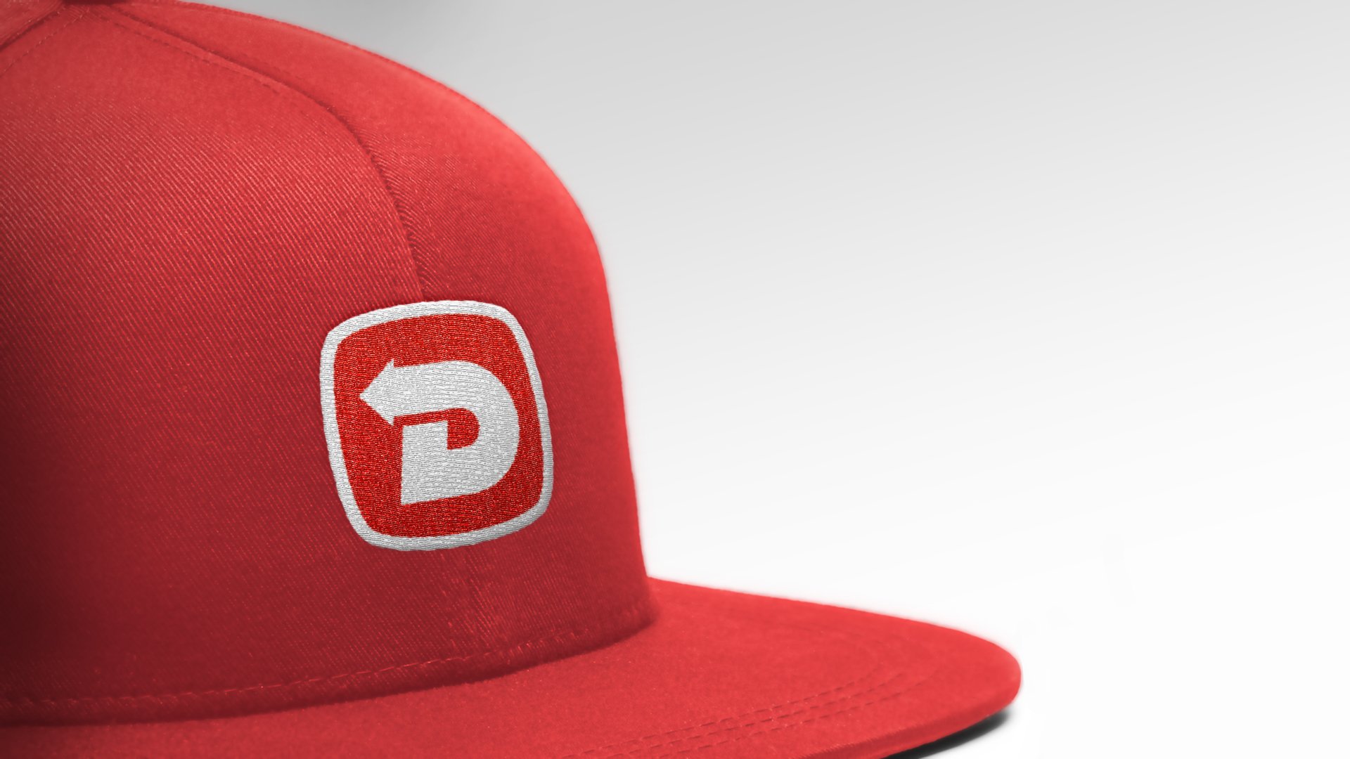 A hat with the DES logo on the front