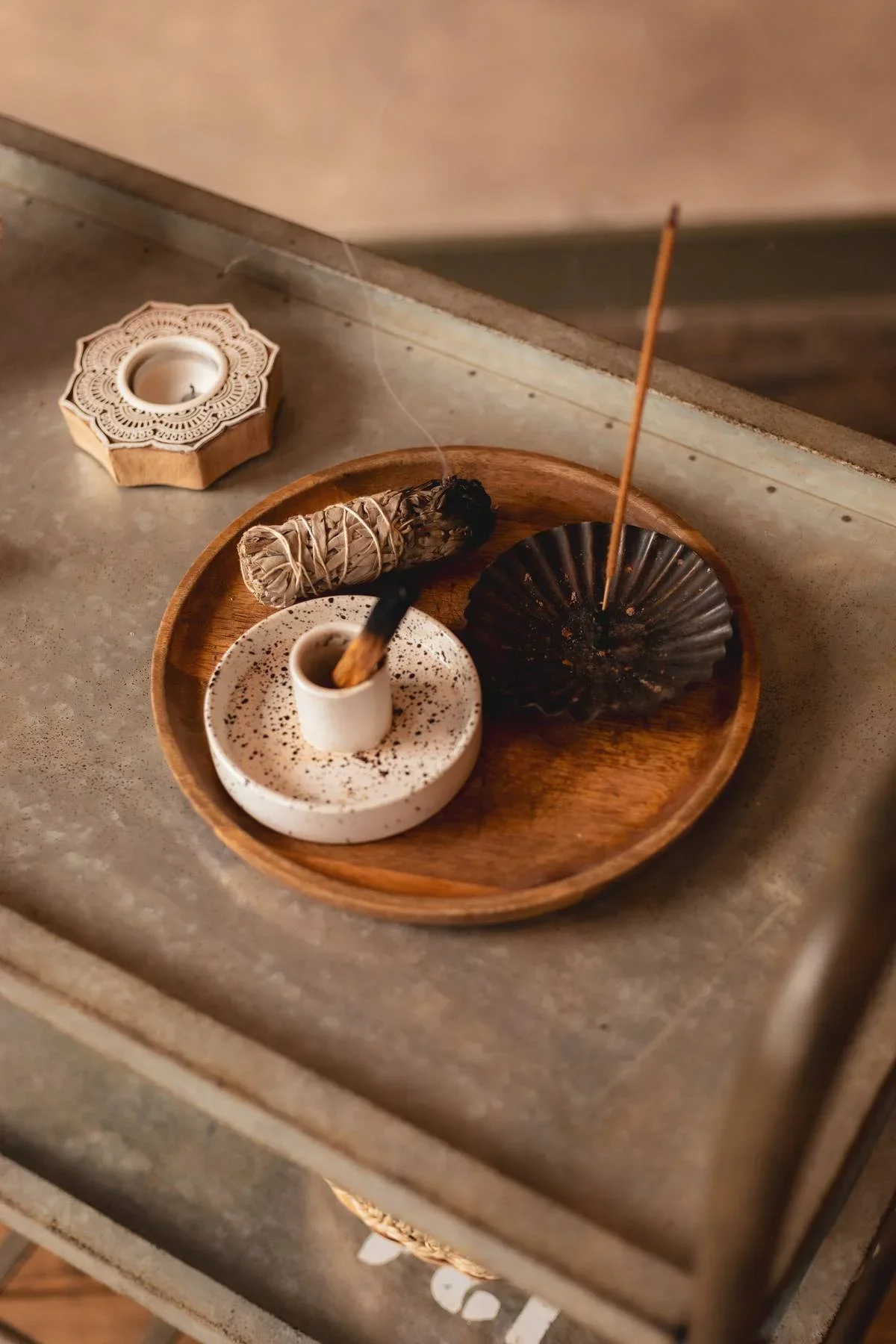 Incense and calming ritual objects used in a yoga studio setting at Heist House Studios