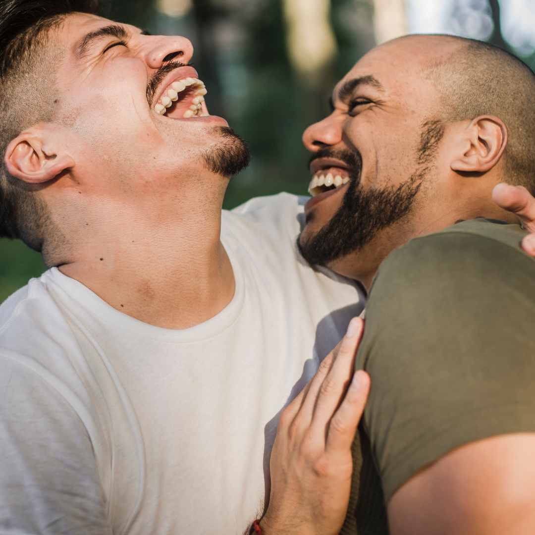 a happy gay man after visiting a gay male therapist