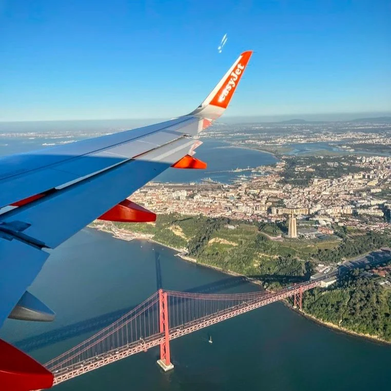 plane flying in to Lisbon airport
