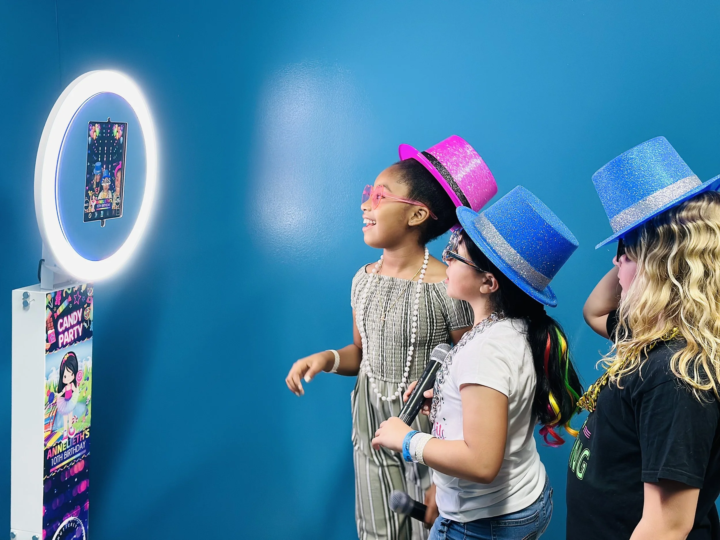 family taking photobooth pic