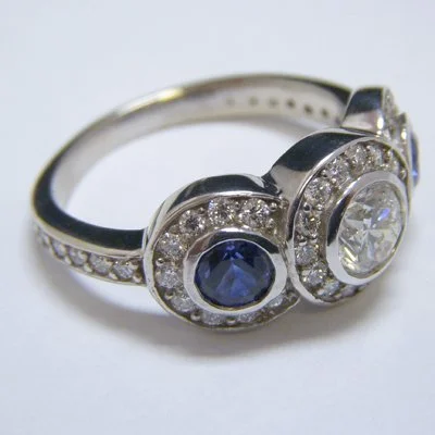 Diamond and Sapphire Halo Ring in White Gold