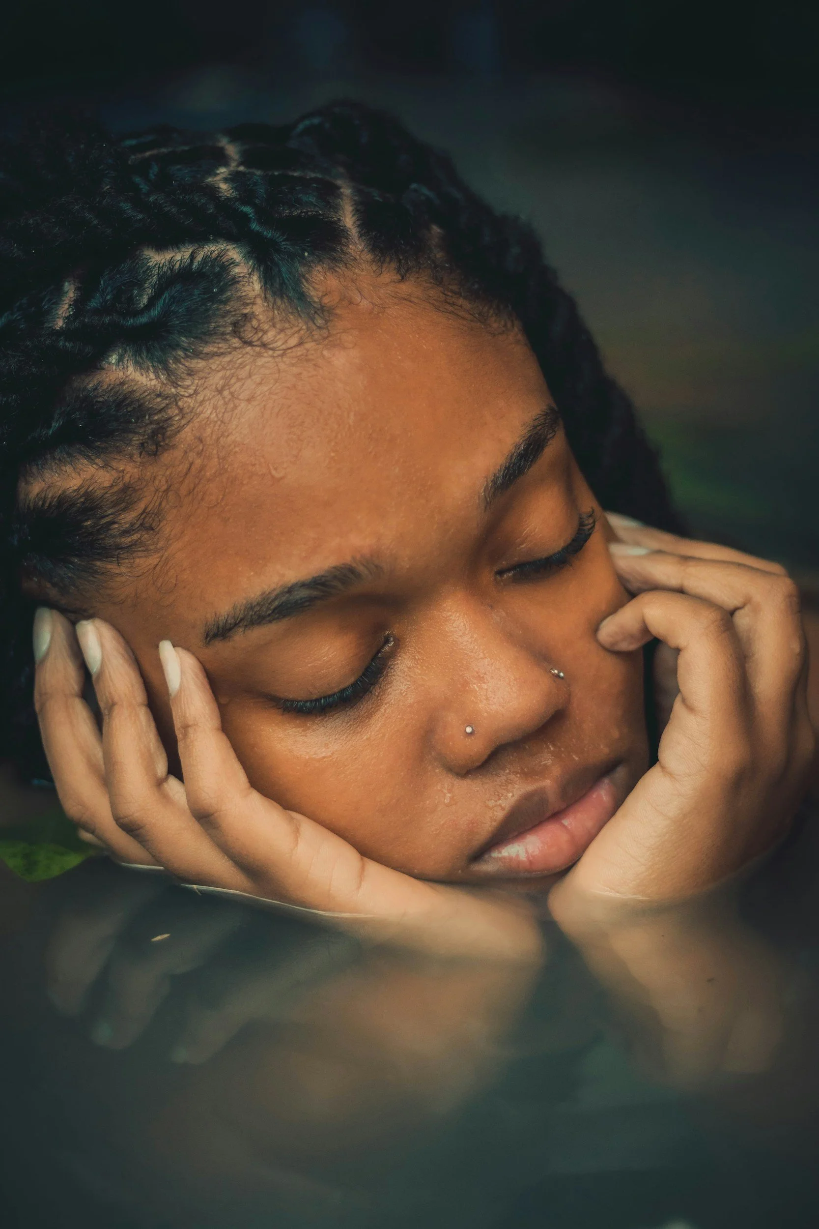 Woman feeling overwhelmed by daily responsibilities and seeking support through burnout therapy and self-care.