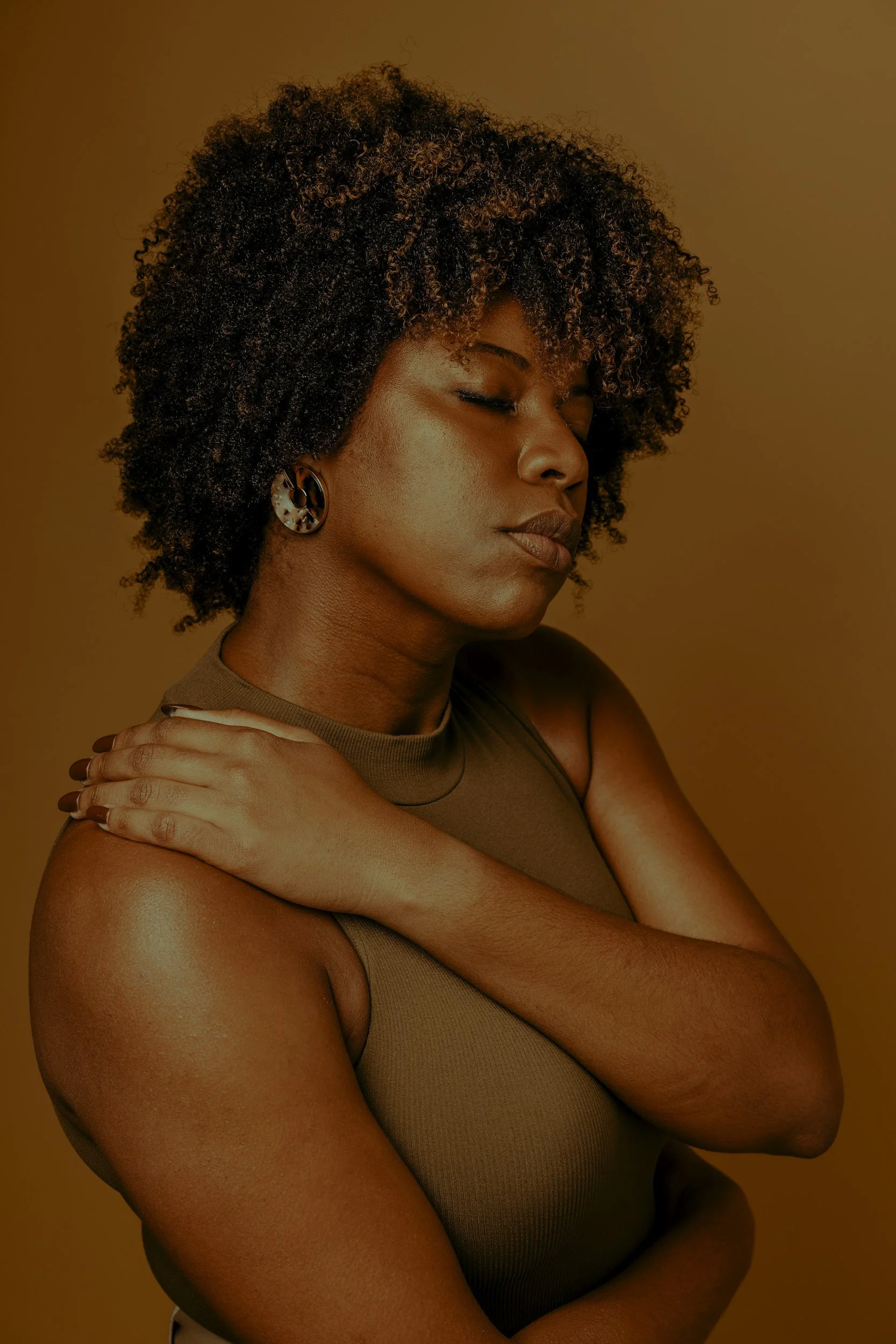 Professional woman experiencing stress and burnout while learning to create healthier boundaries and balance.