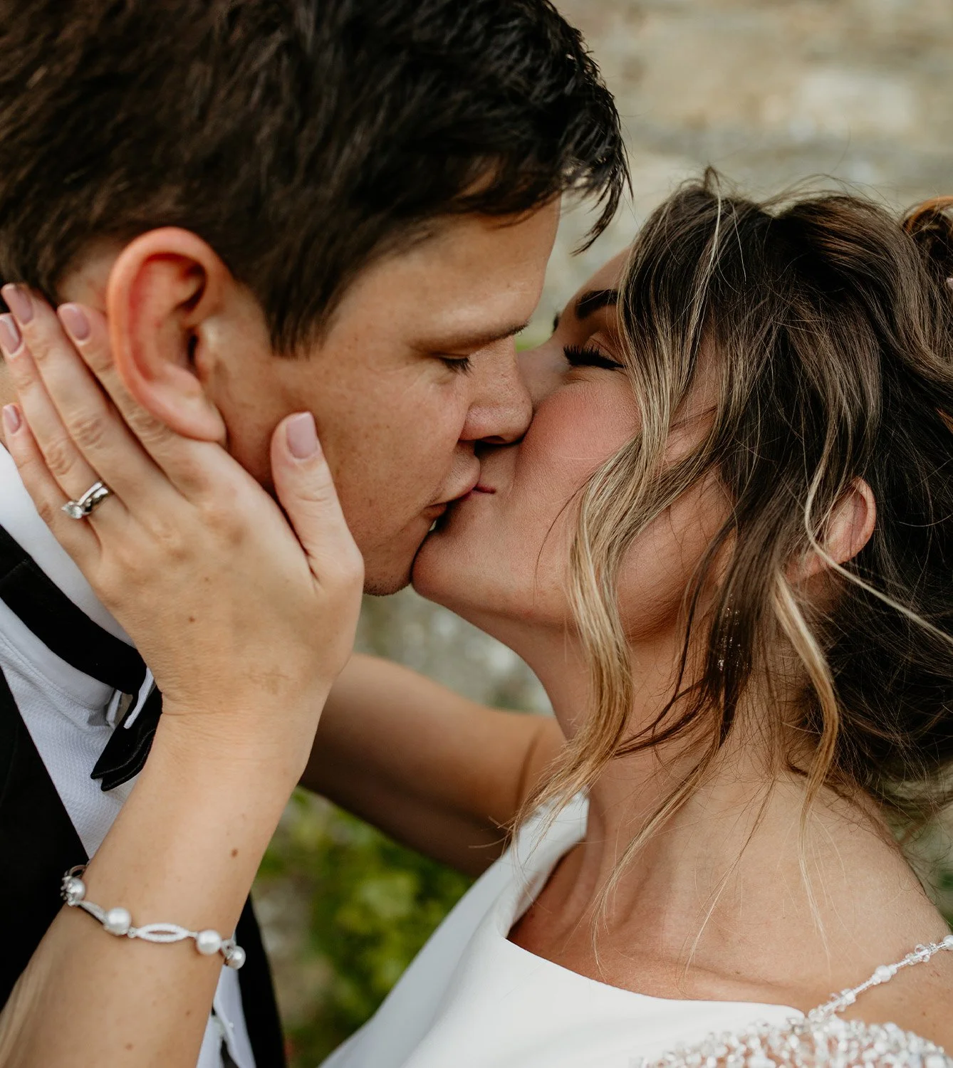 bride and groom first kiss